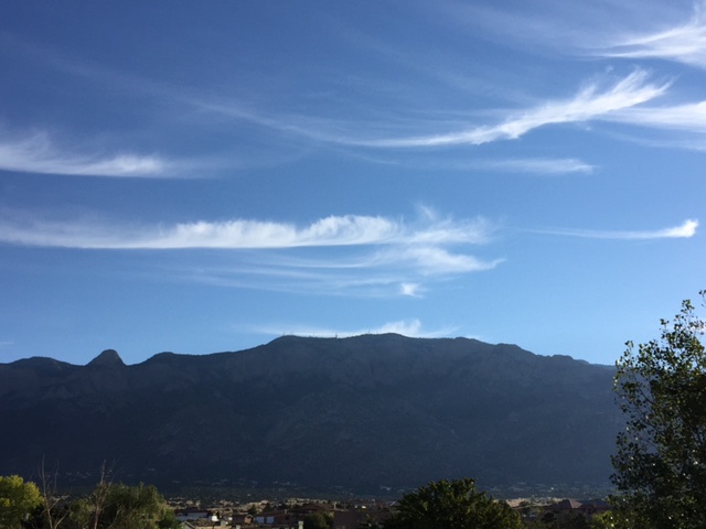 Your view of the 10,678 ft Sandia Mountain just 2 miles away.  Be sure to look west during sunset to see why it's call Sandia.