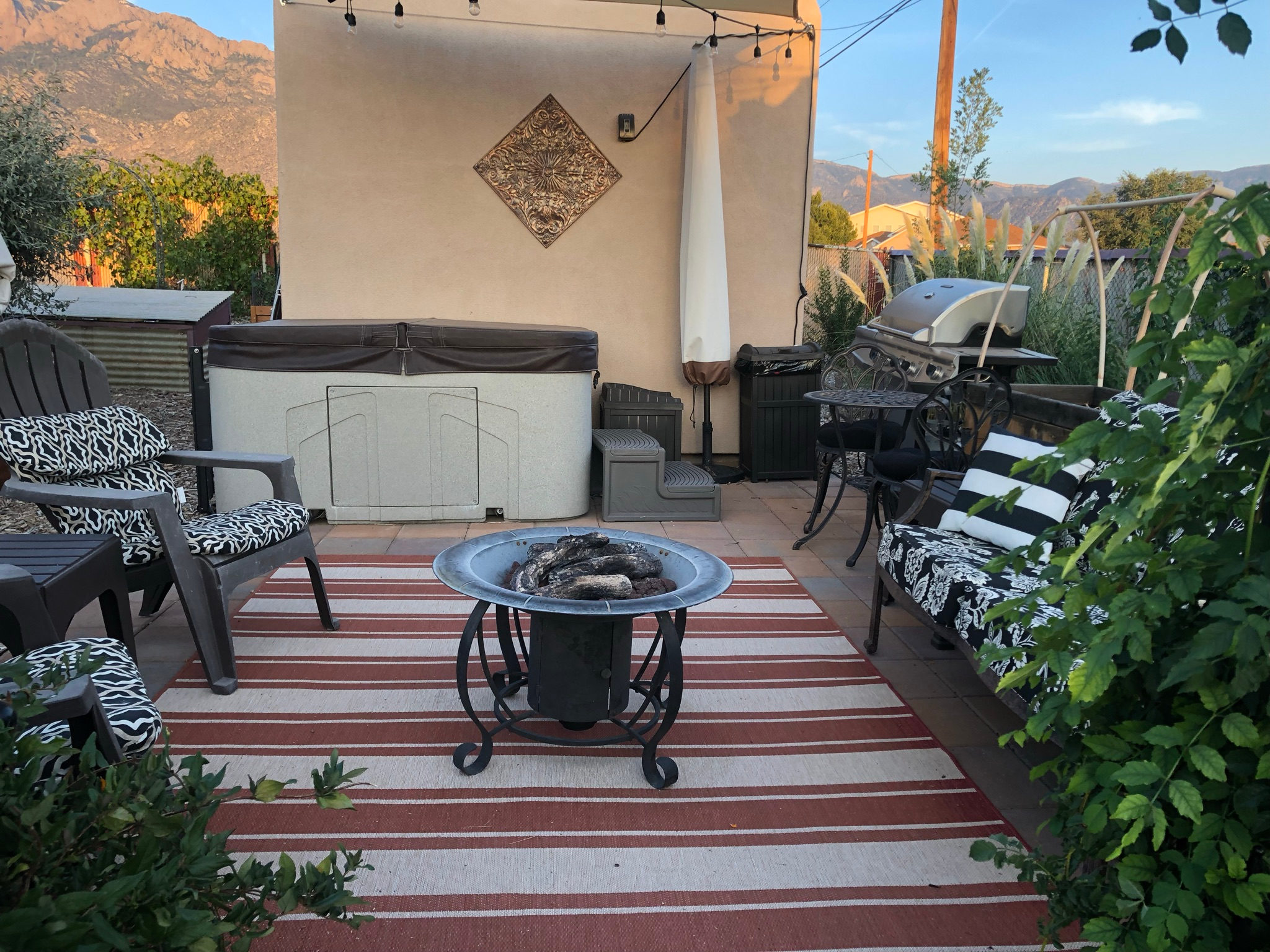 Your private shaded patio with mountain and city light views