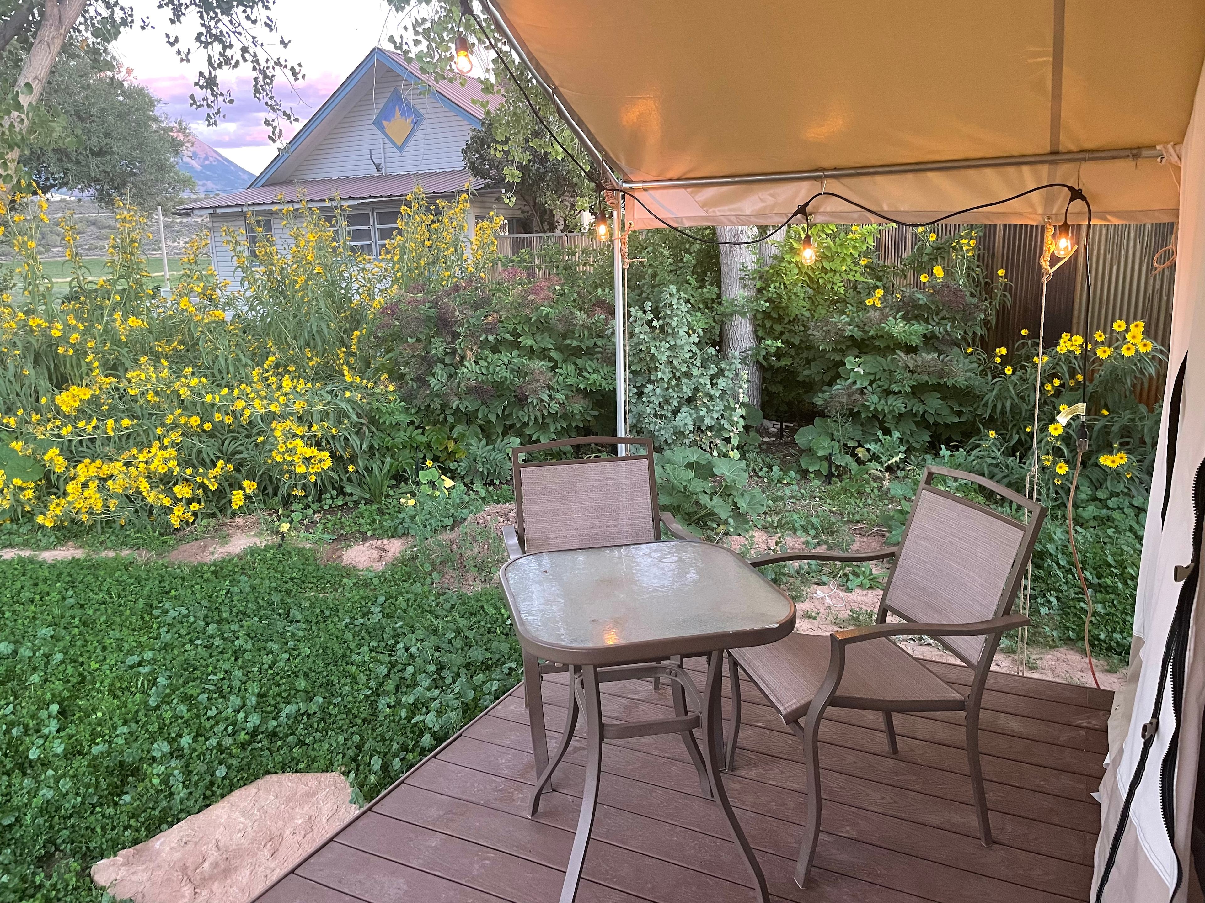 Sitting area on the porch for guests to relax on. 