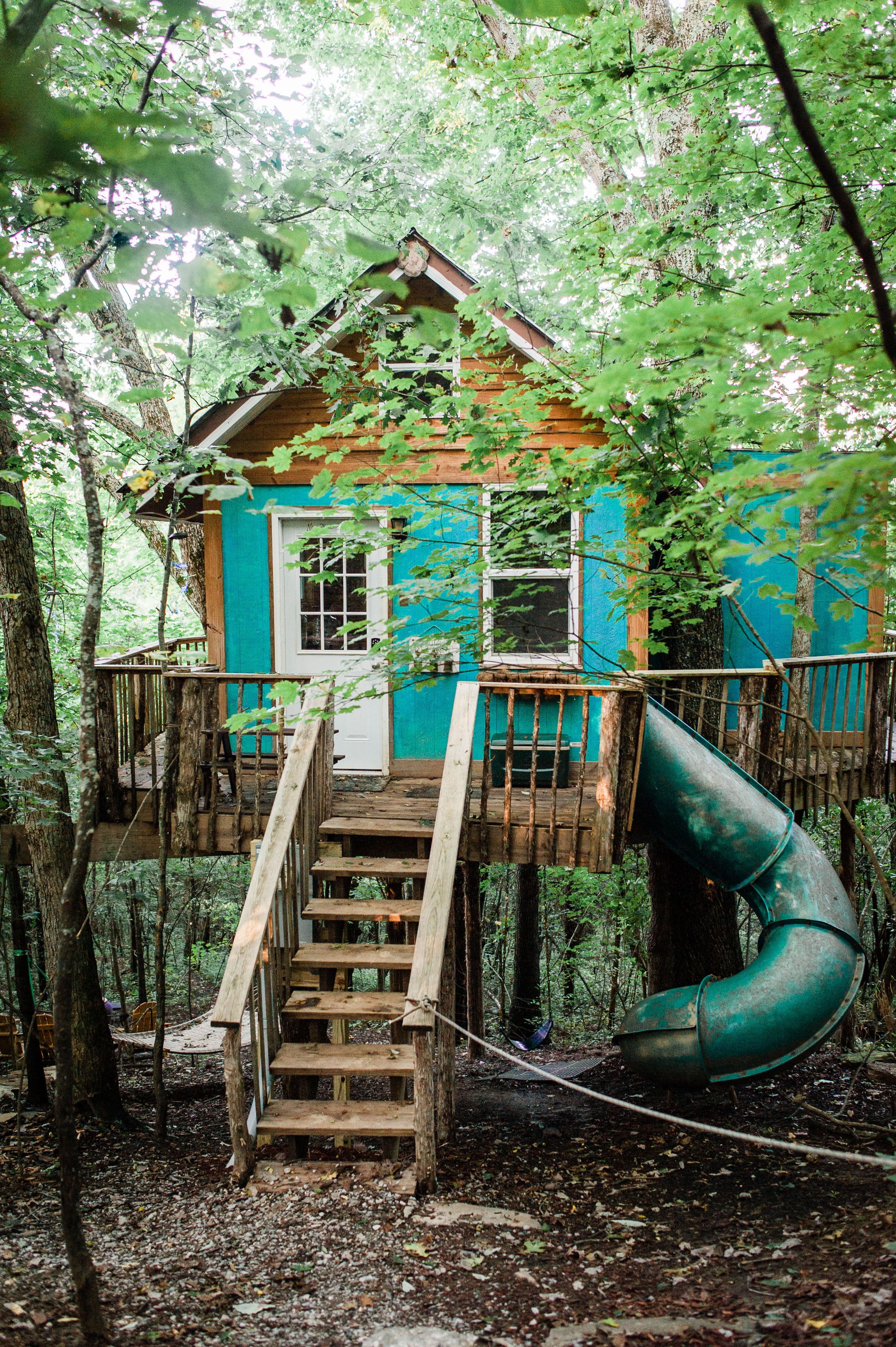 The Hickory - an amazing treehouse with an awesome slide