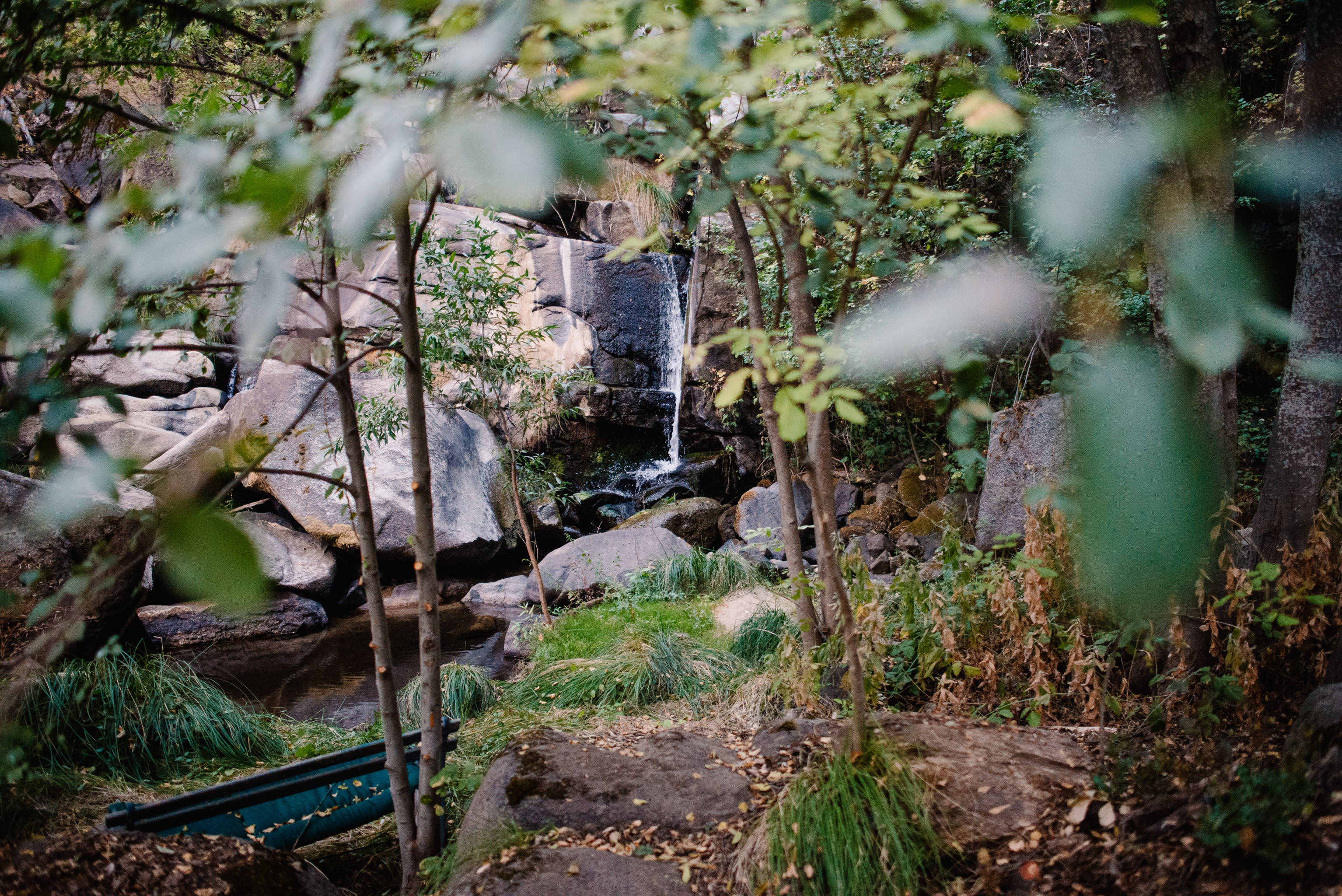 One of the falls with a bench