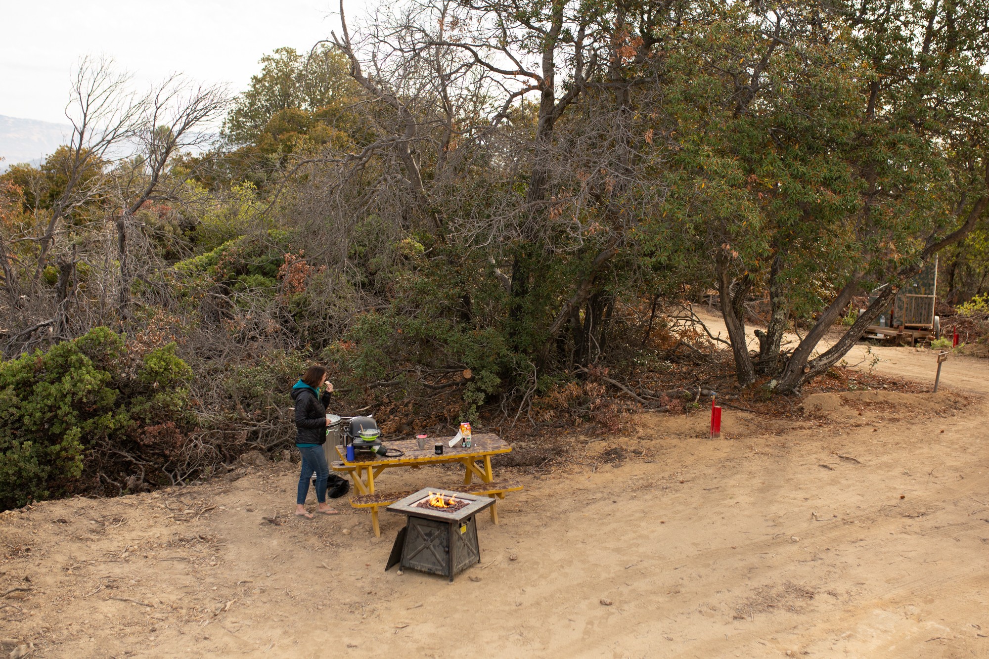 Cooking breakfast in the morning and having the fire pit warm us up before the sun hit us!