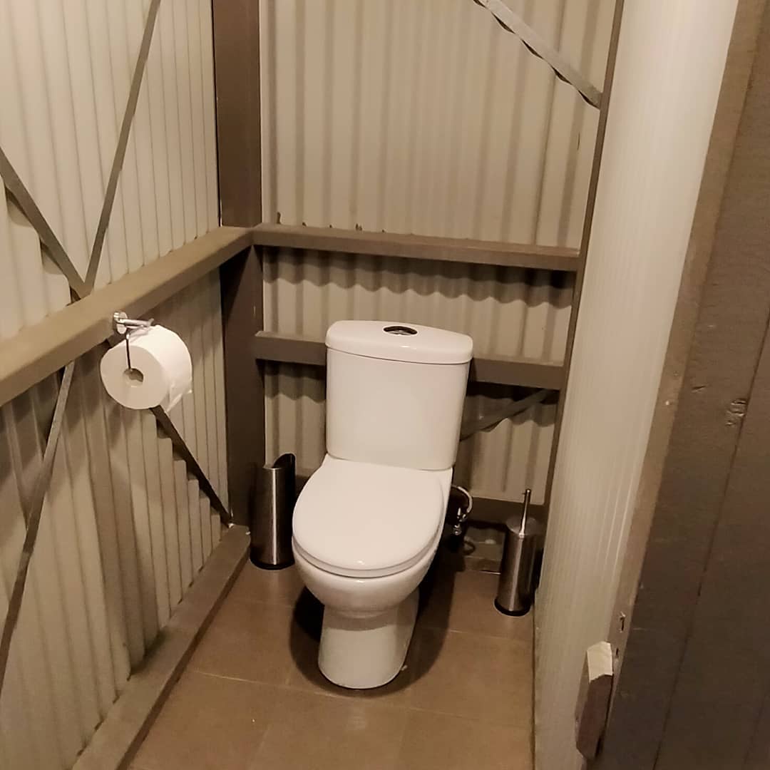 Toilet and shower block