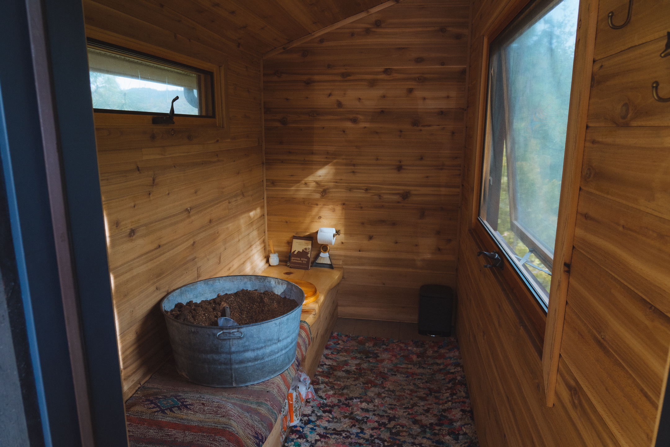 Composting toilet in the outhouse. Saw dust is used after each use to ensure proper composting.