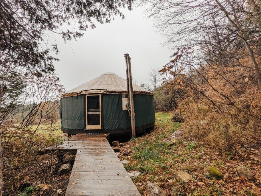 The yurt! The pipe is the exhaust for the woodstove