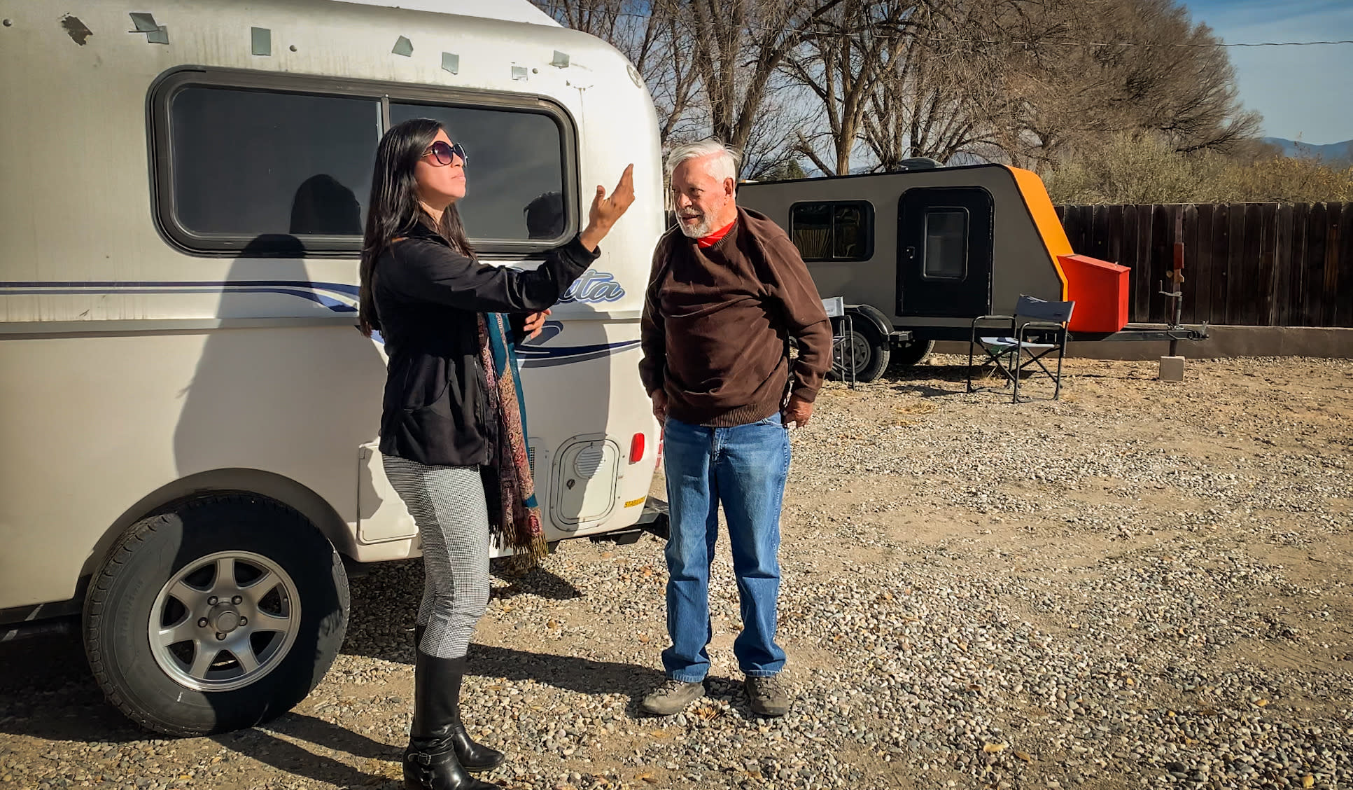 My friend Elsa speaking with the camp host Luis Torres.