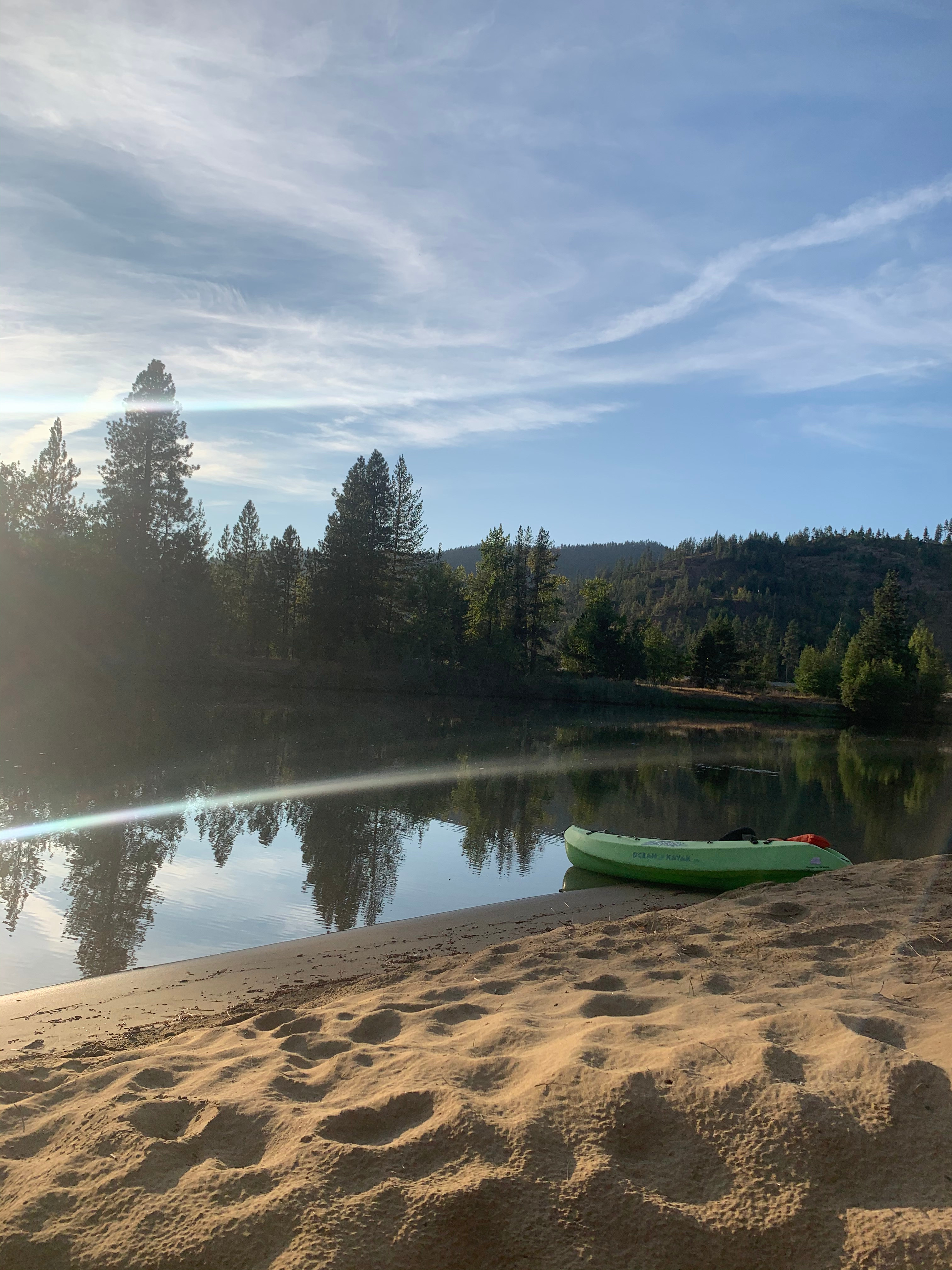 Amazing soft sand. The campsite is across the river in the background. Kayak, canoe, or swim (with caution).