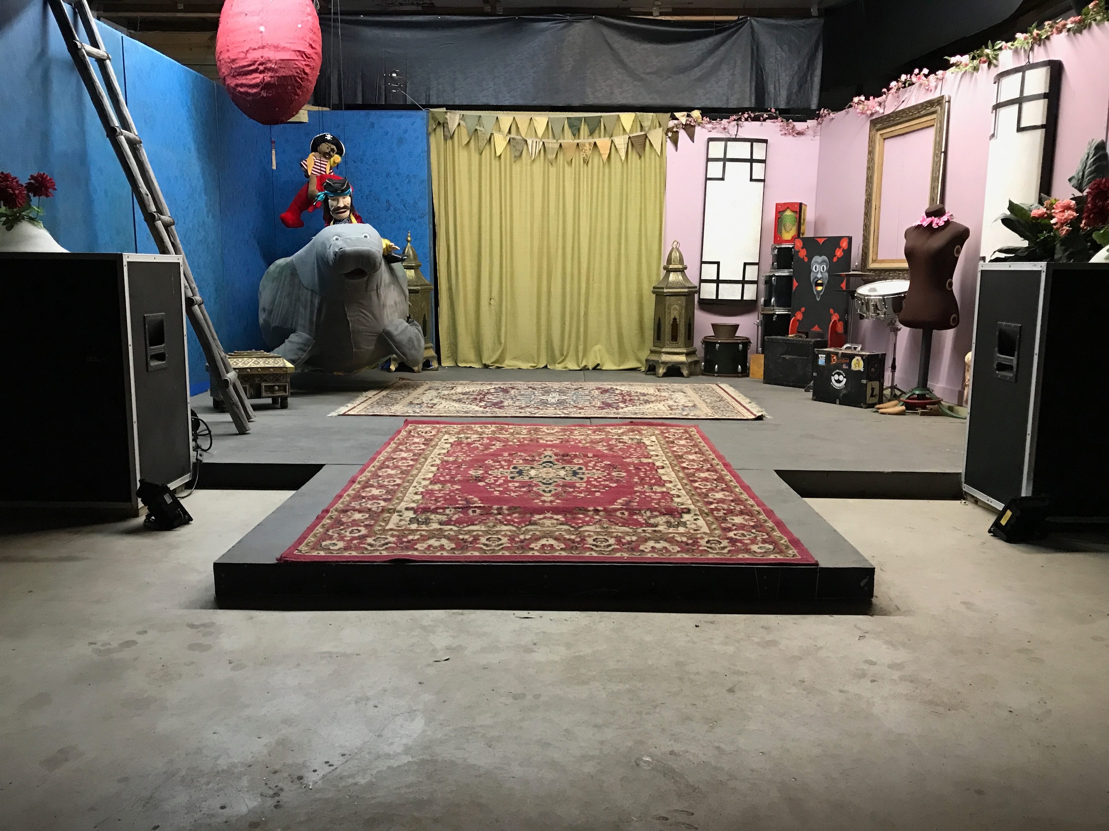 Raised stage area. Complete with manatee and pirate. Ask about seeing the Flea Circus!