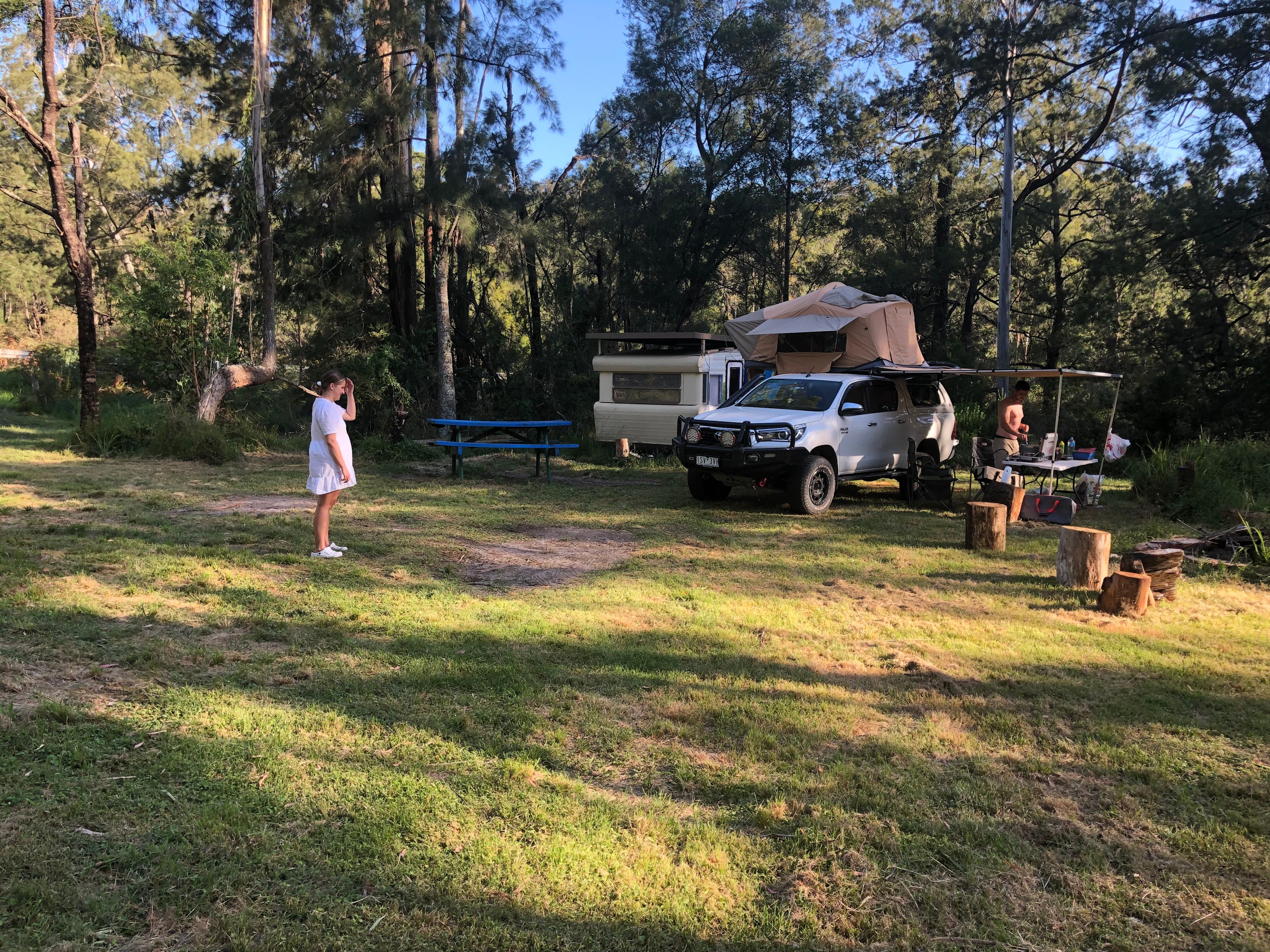 Big secluded space with a winter fire pit, picnic table and summer shade. 