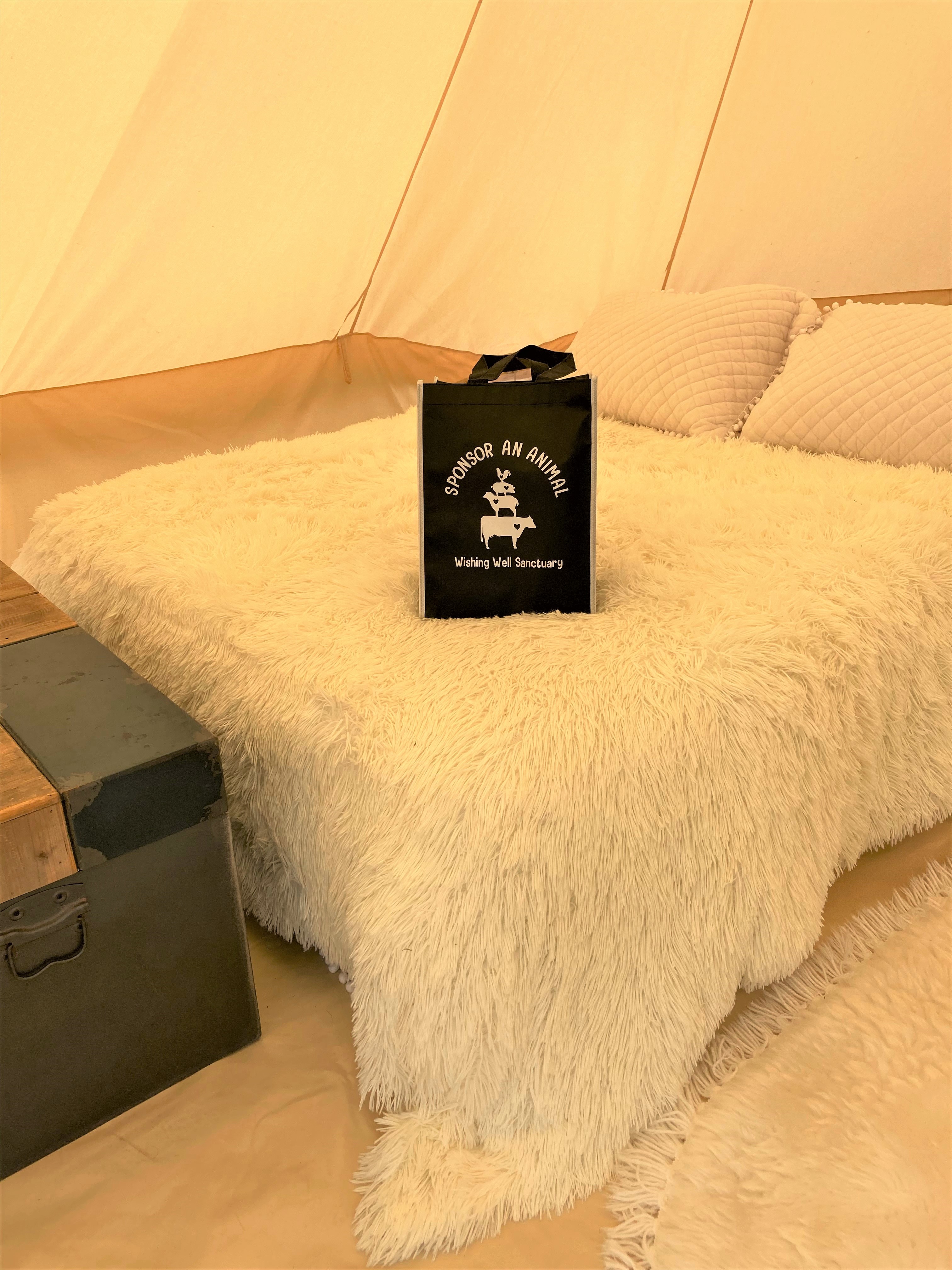 real queen size bed with all linens