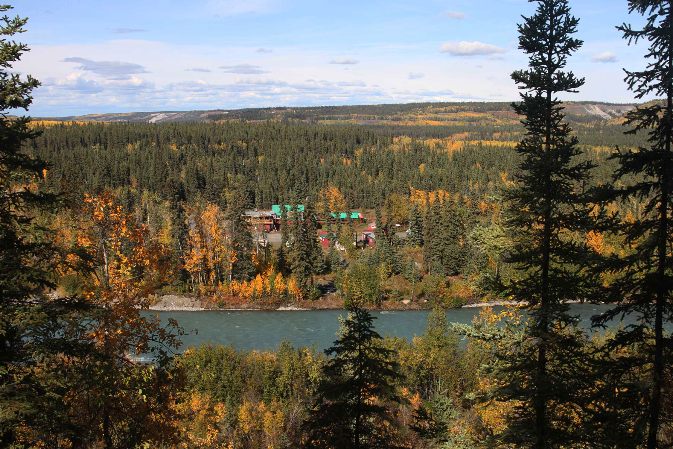 View of property from the south looking north. The two-story building on the far left is the bar. Pix is centered on the riverside camping area. 
