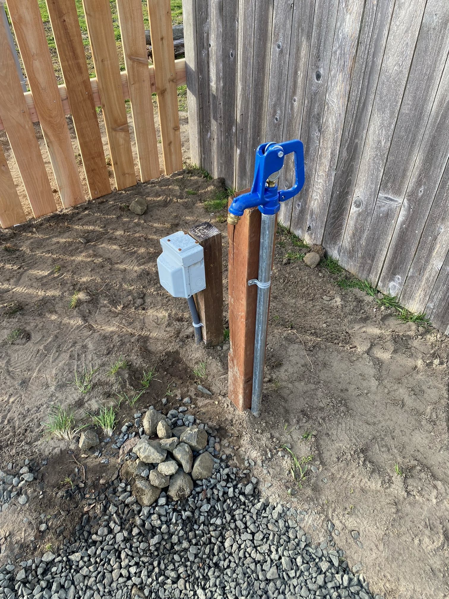 Spigot and electrical hookup located in rear corner of RV space