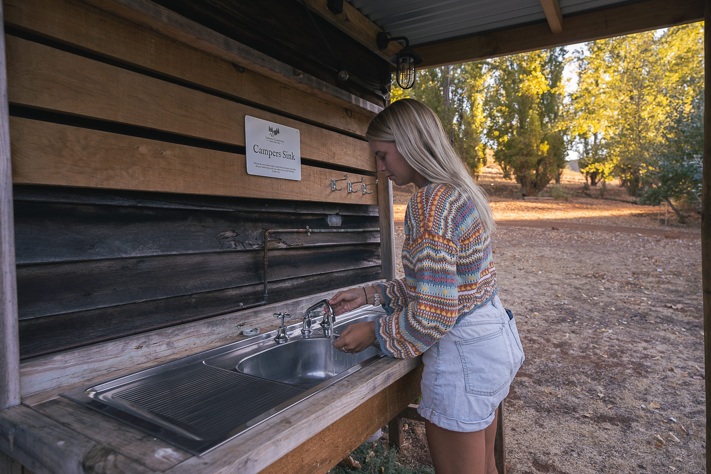 Camp sink with running water to wash your dishes.