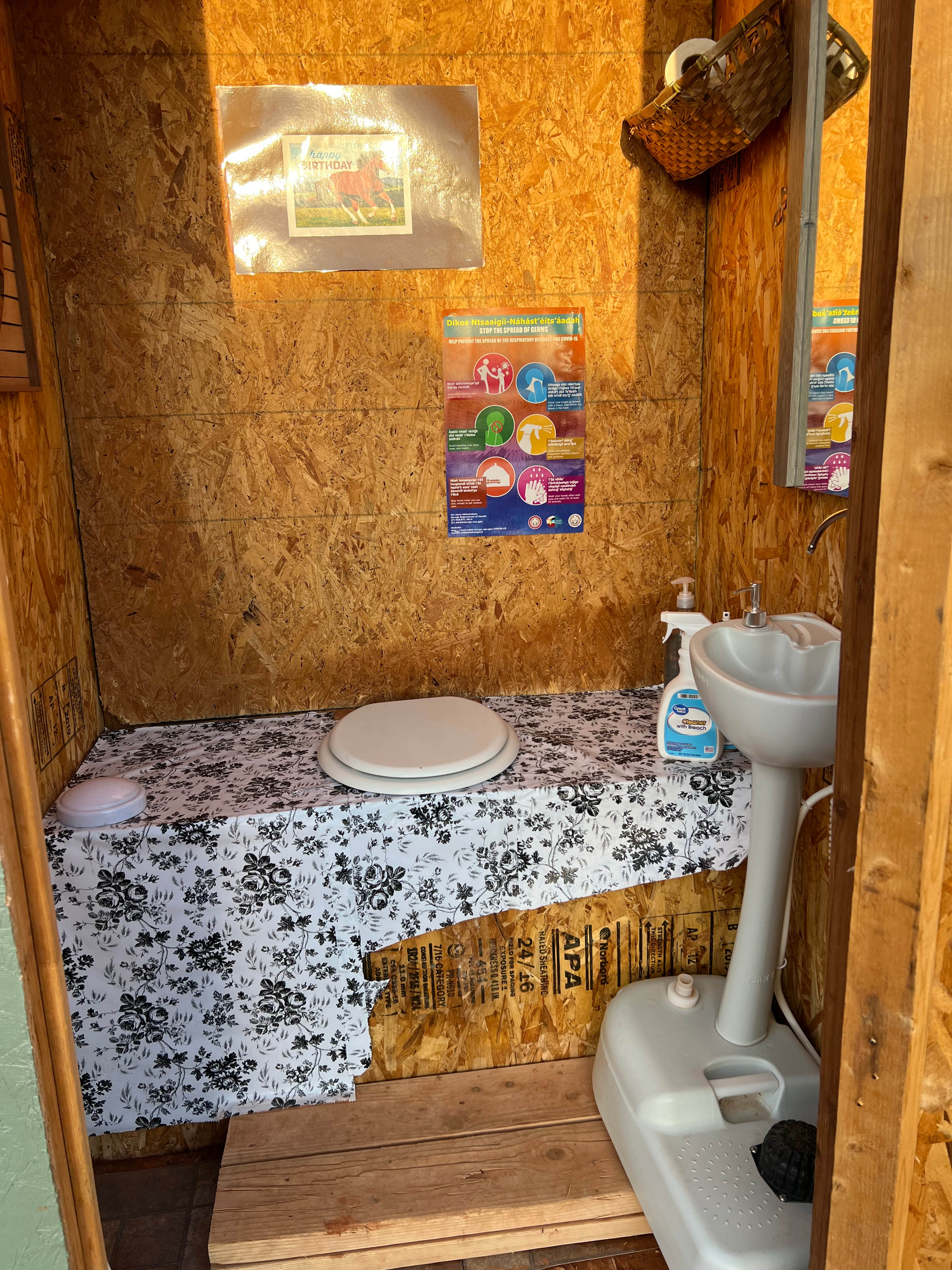 Inside clean pit toilet 