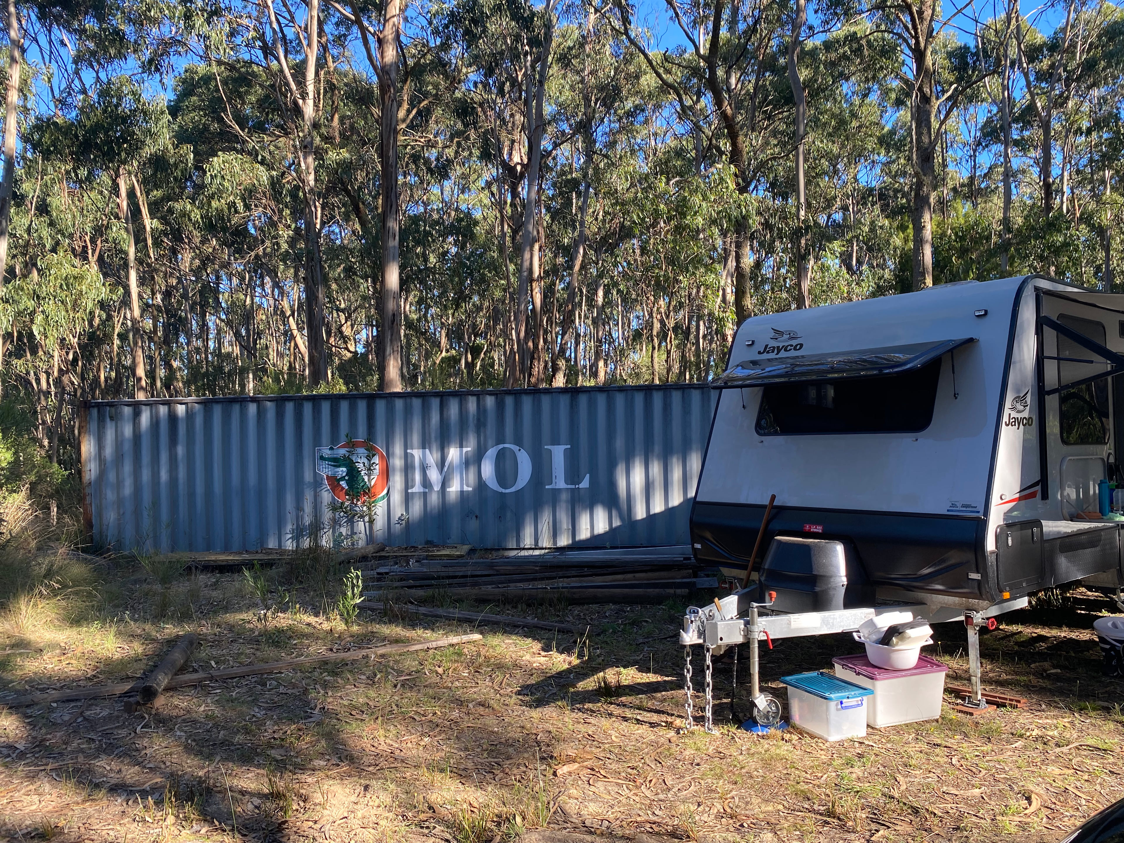 Position your caravan facing away from shipping container to maximise the view. Our 23 foot van fit in this position nicely.