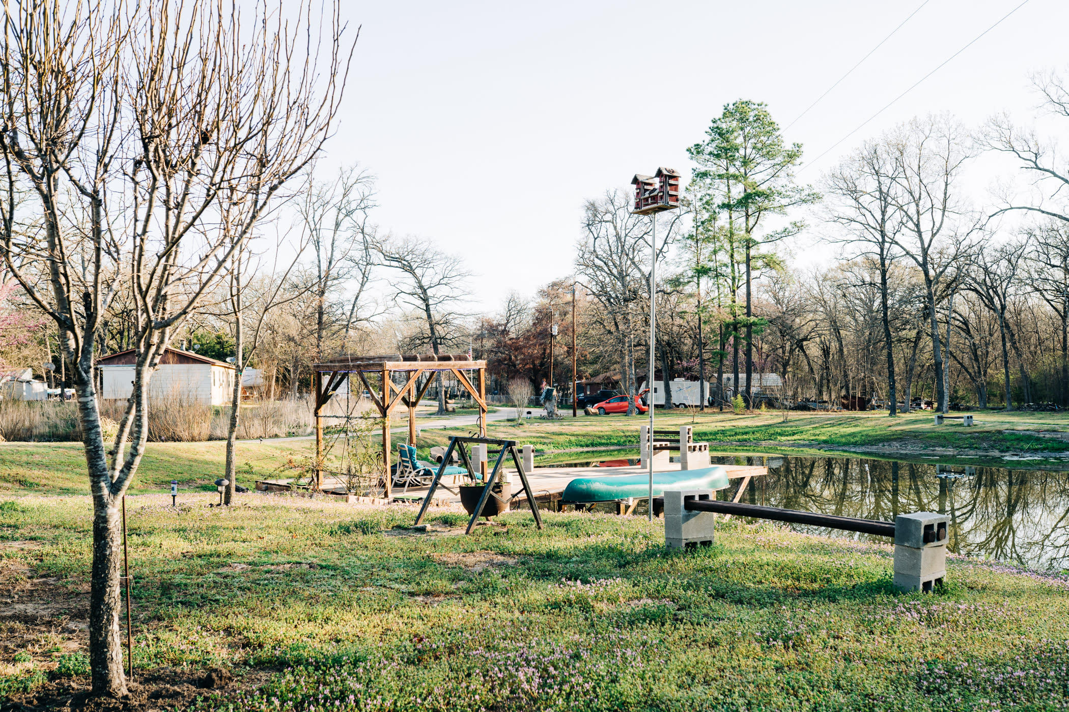 The dock is super cute - fishing poles, a canoe/oar, and relaxing lounge spots! 