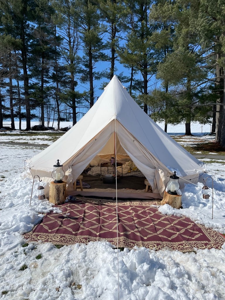 Views of woods, pond, and sunrise