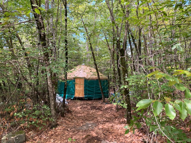 the parking spot next to the yurt