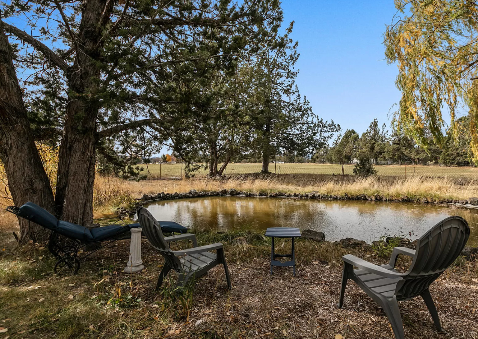 Relax by the pond with some peekaboo mountain views
