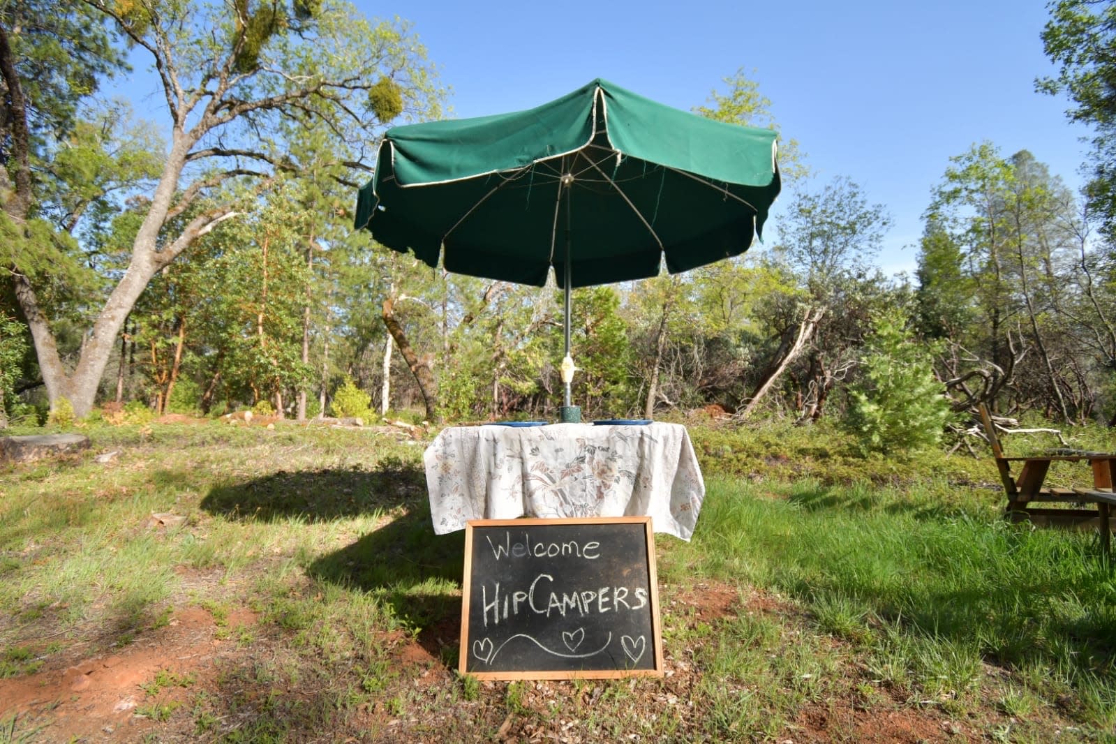 Two tables, 5 chairs and a view of the starry night are provided. Also a Hose bib with potable water are at the site. 