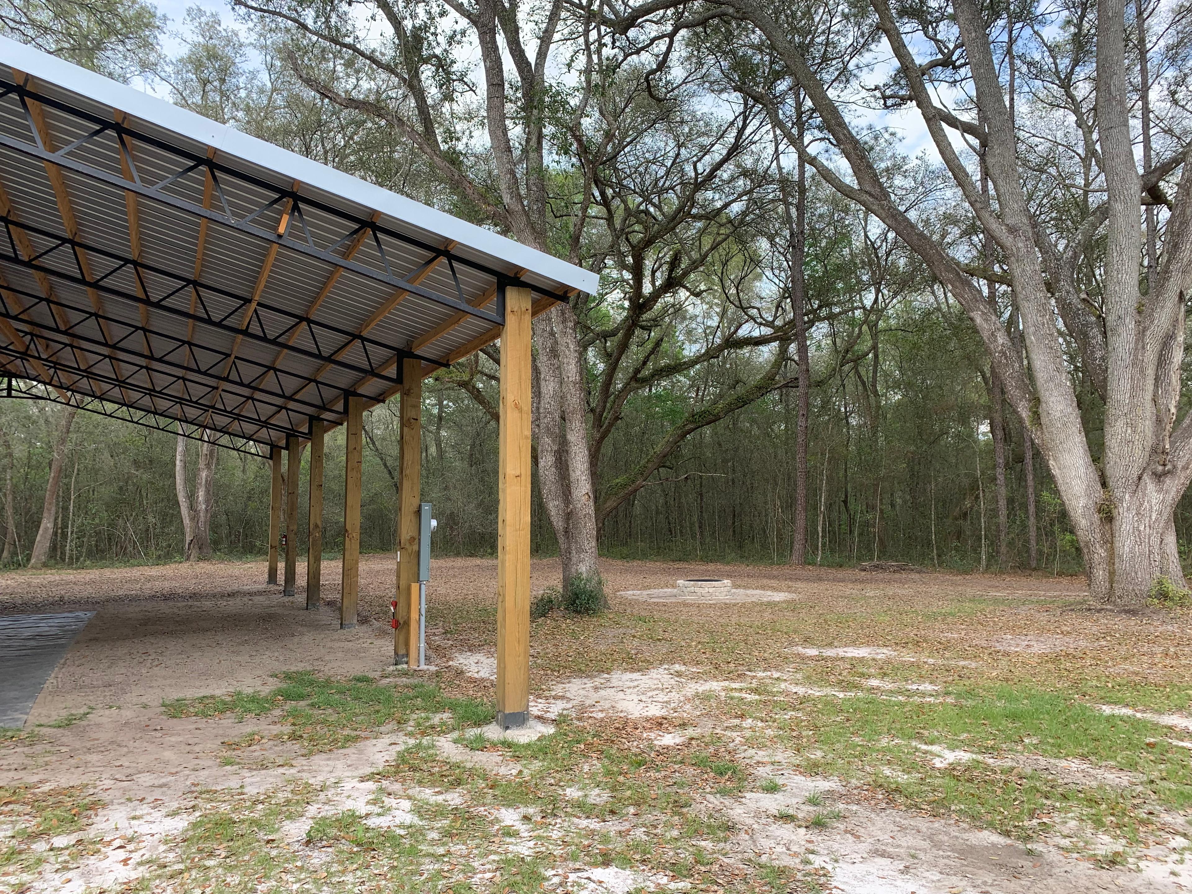 Camper rental side of pole barn closest to fire pit