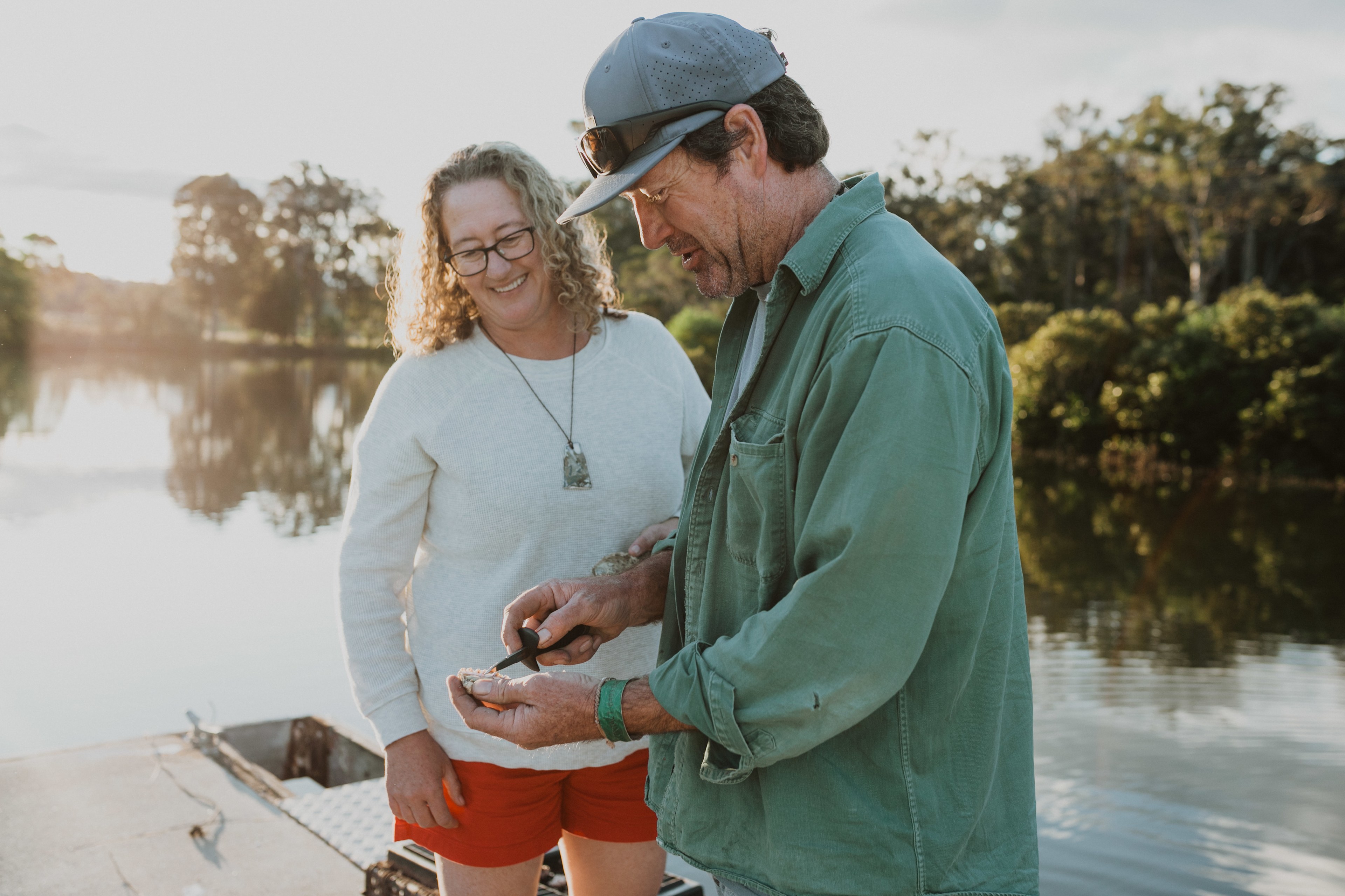 The hosts Jodie and Brett showing us their oysters from their farm.