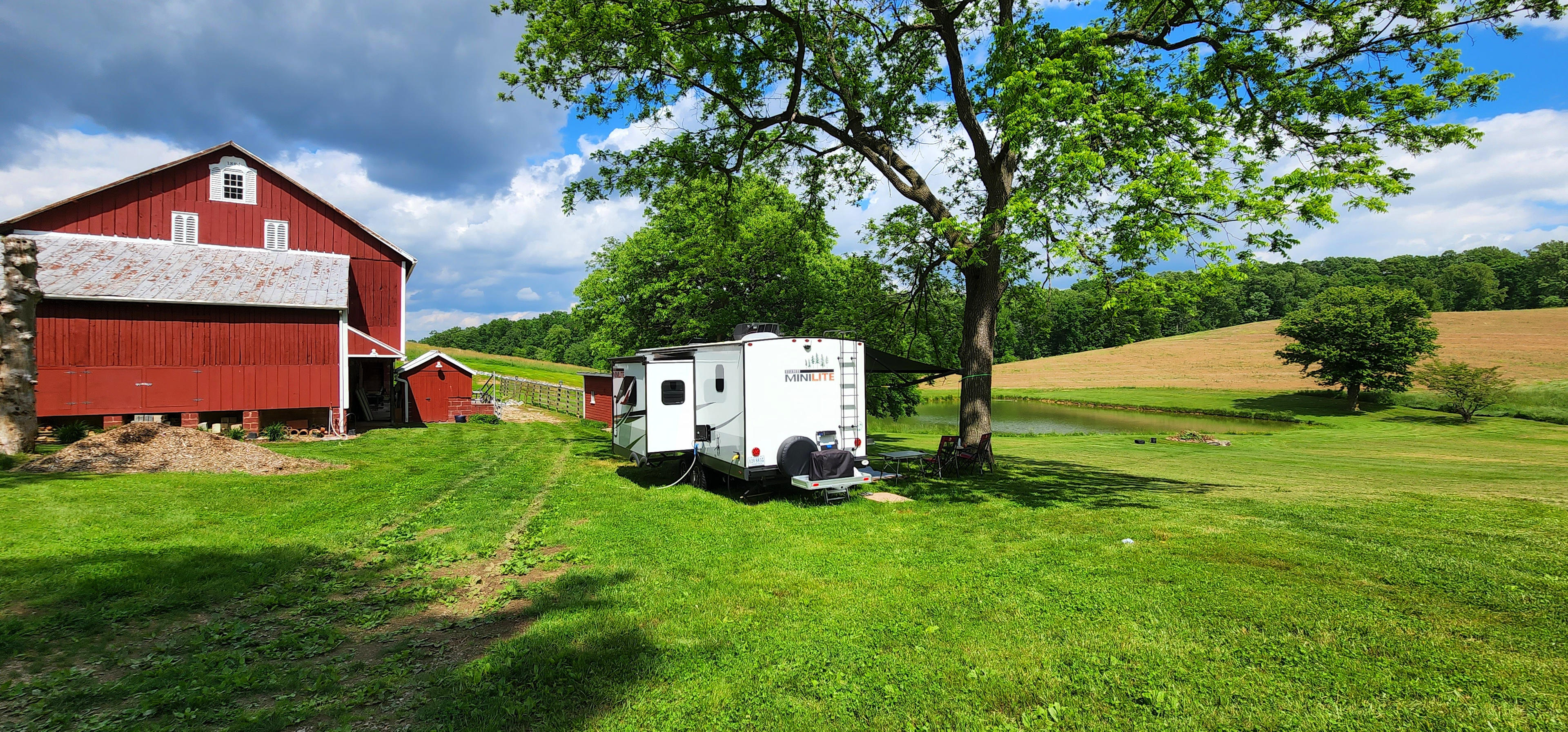 Views of woods, pond, and sunrise