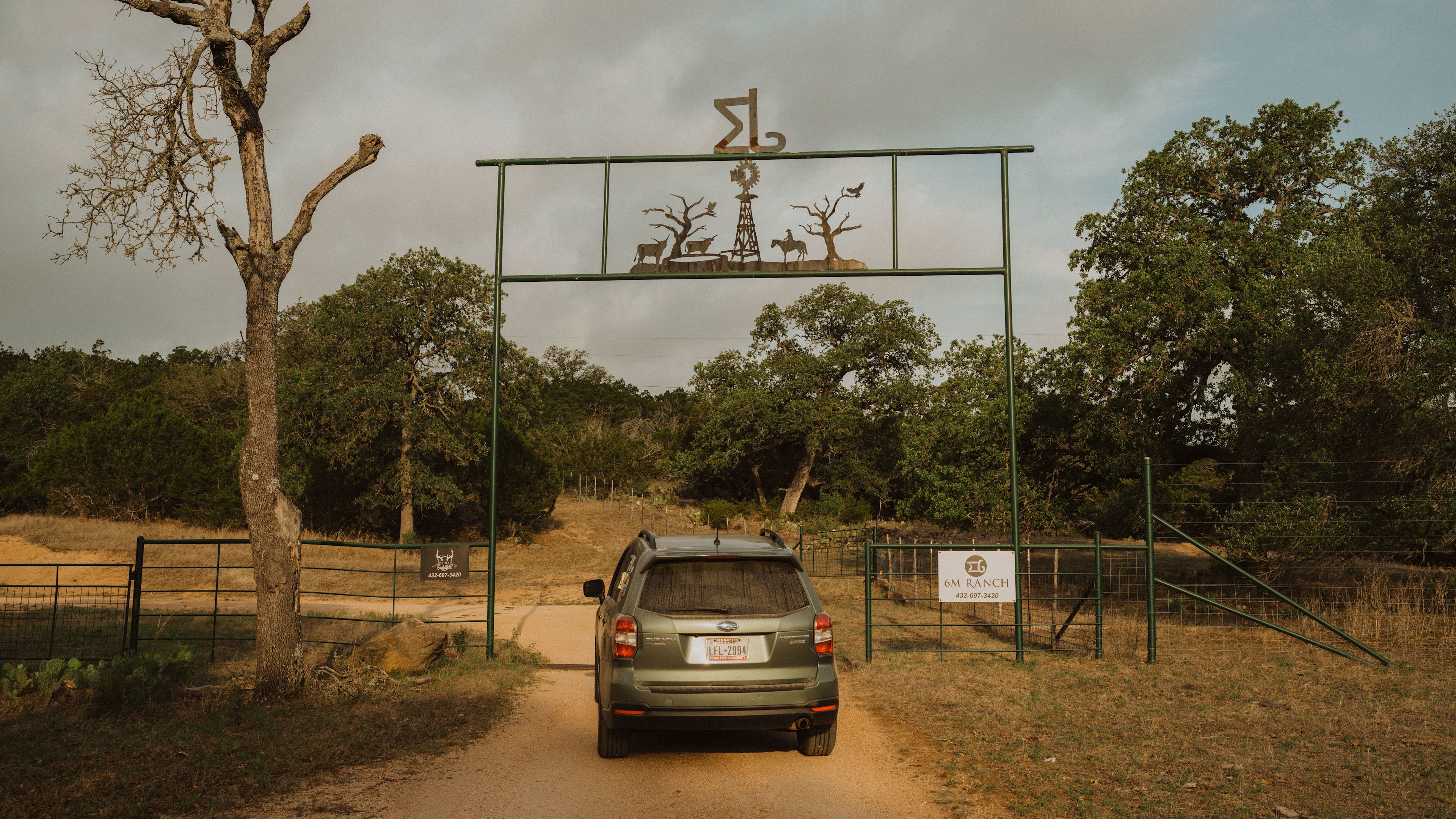 When you turn off the road, as the instructions note, you will continue to drive for awhile and most likely will not have service. Keep passing by ranches until you arrive at this gate, then the outpost will be a few turns away. You got this! It's worth it. 