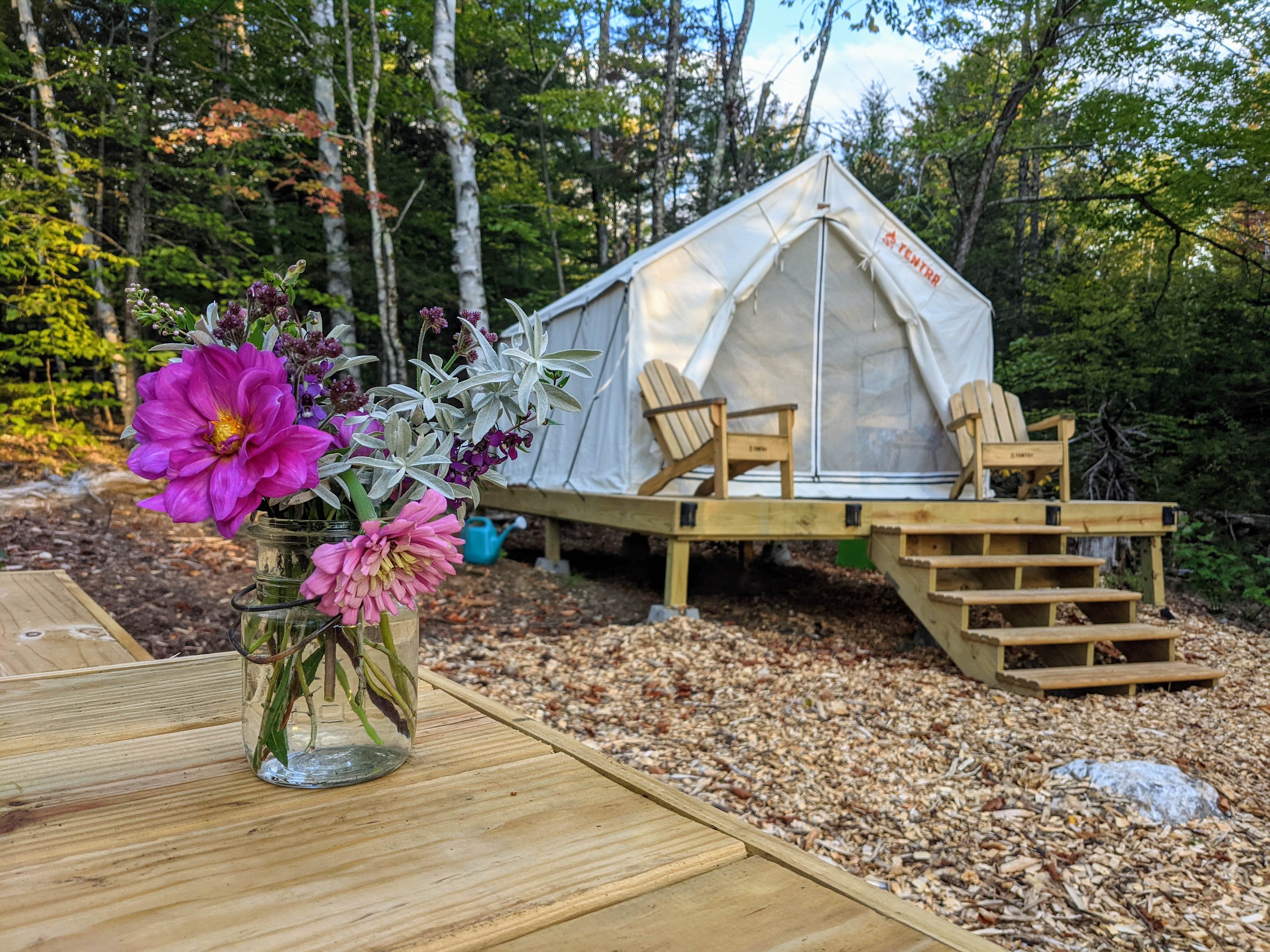 Each tent has a mattress cover with two pillows, a velvet blanket, and two camp blankets. You must bring your own queen sheets and pillowcases!