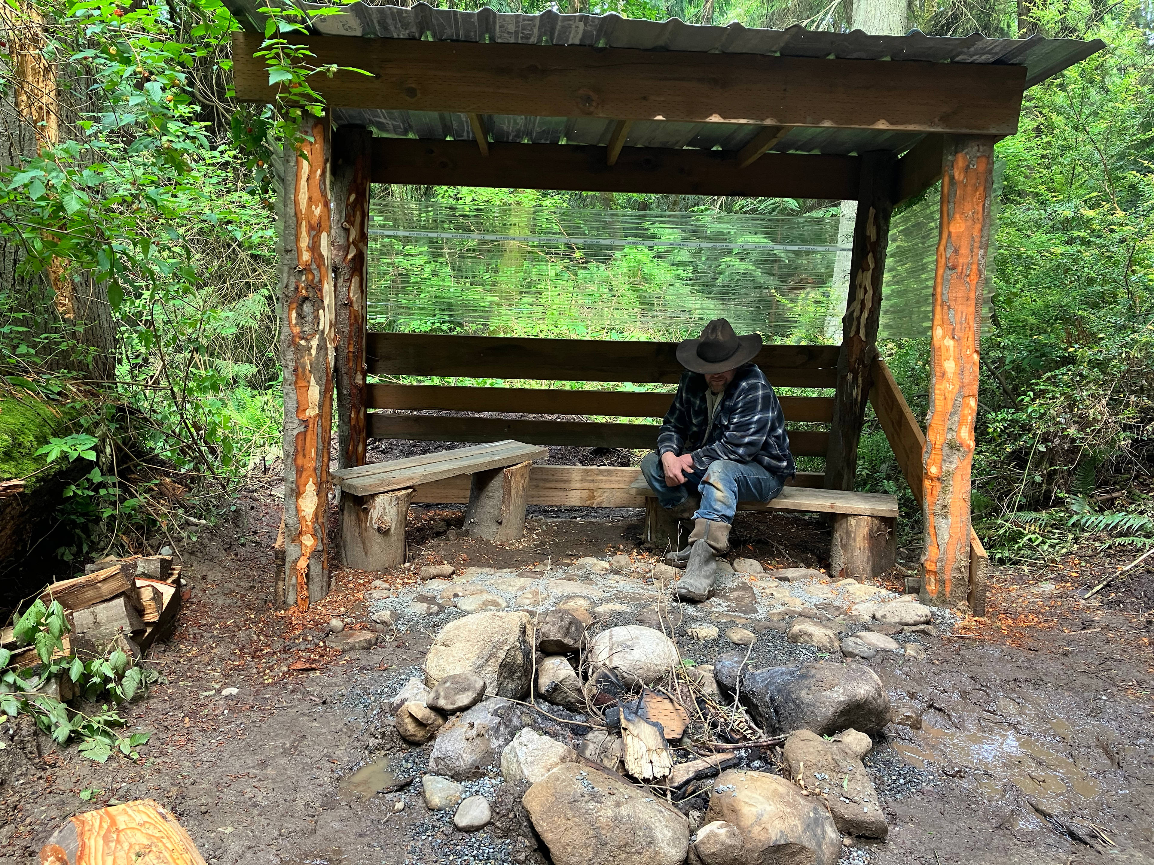 Enjoy a fire under a roofed porch.
