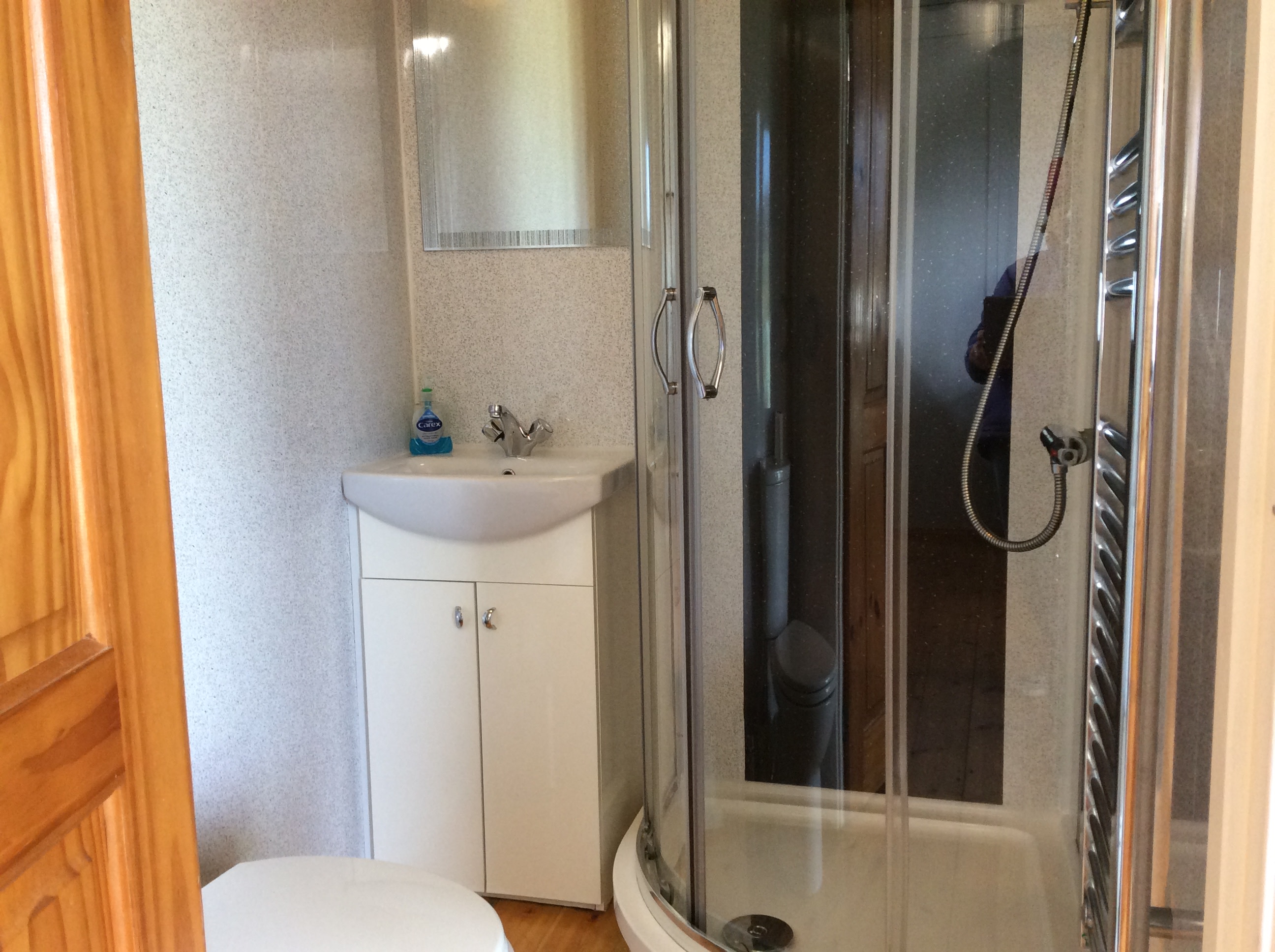 Comfortable sized bathroom, including shower, loo and hand basin.