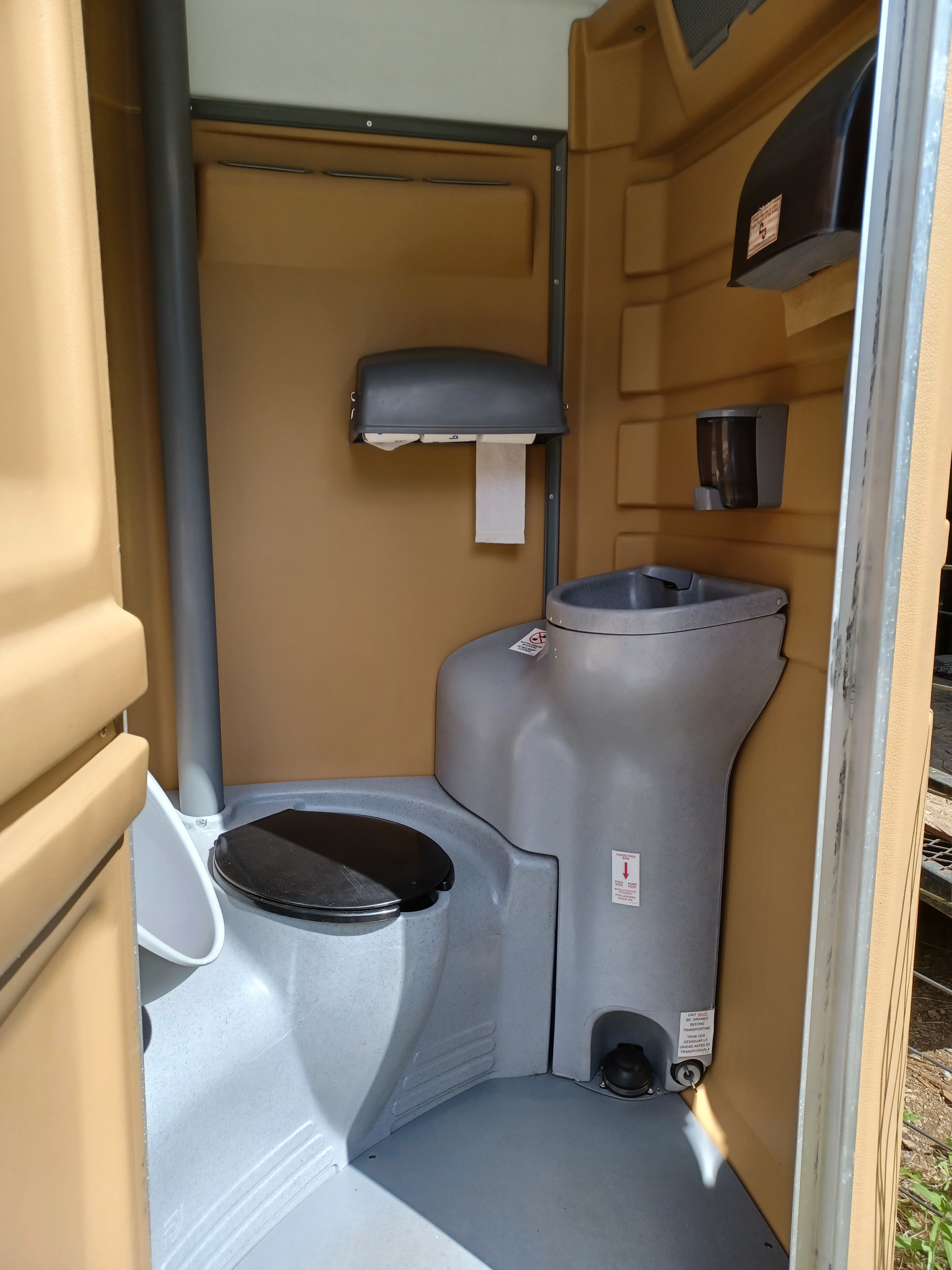 This porta potty is super clean, and has a sink for handwashing!