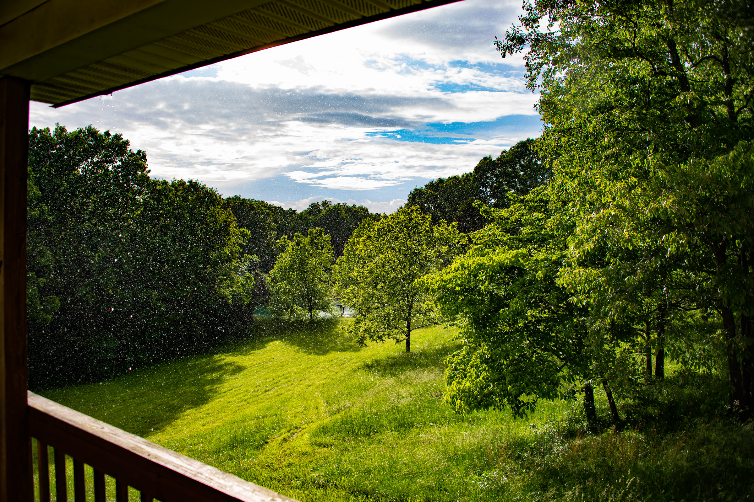Watching a sunshower from the porch