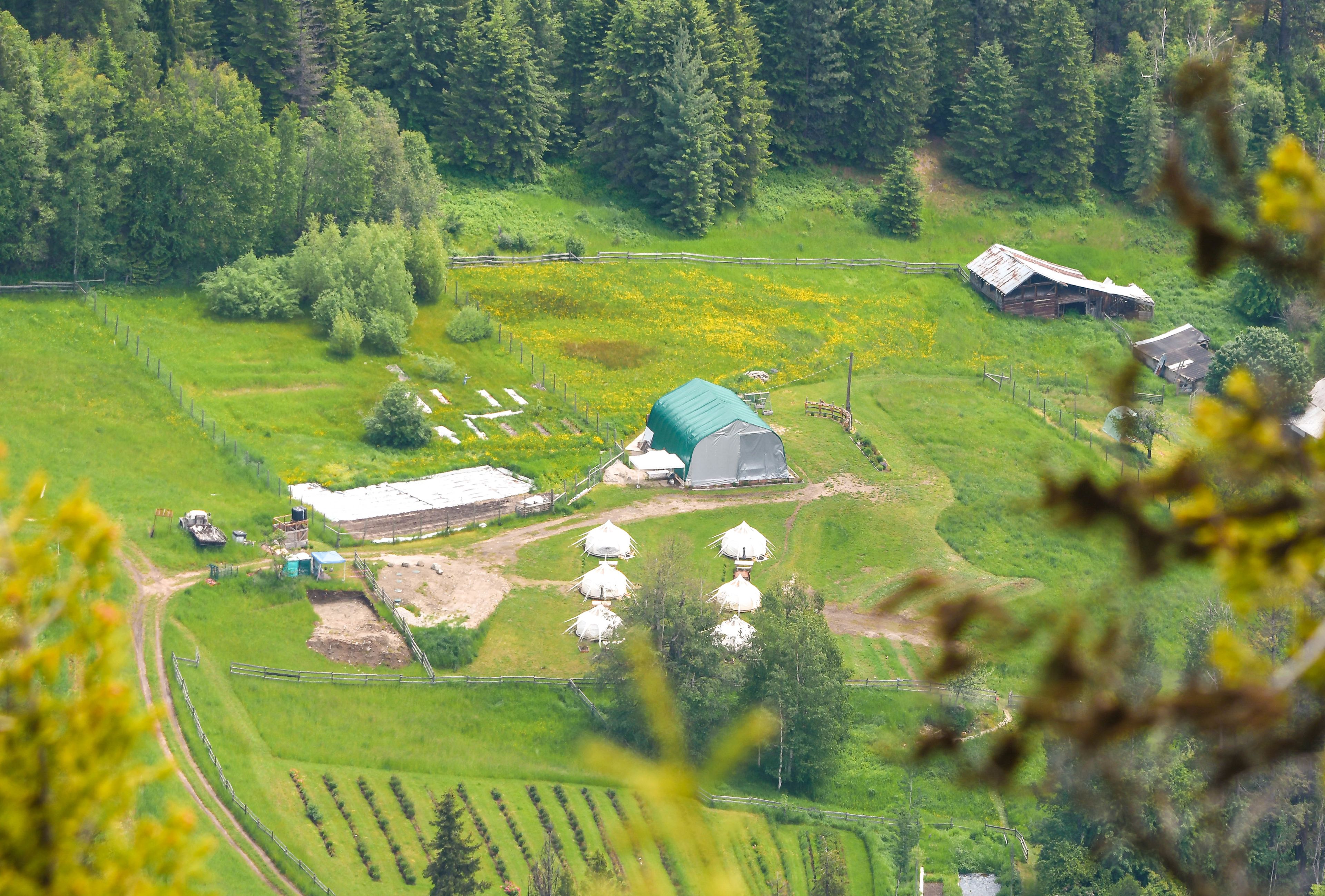 A view of the Yurts and event center from the top of the hike