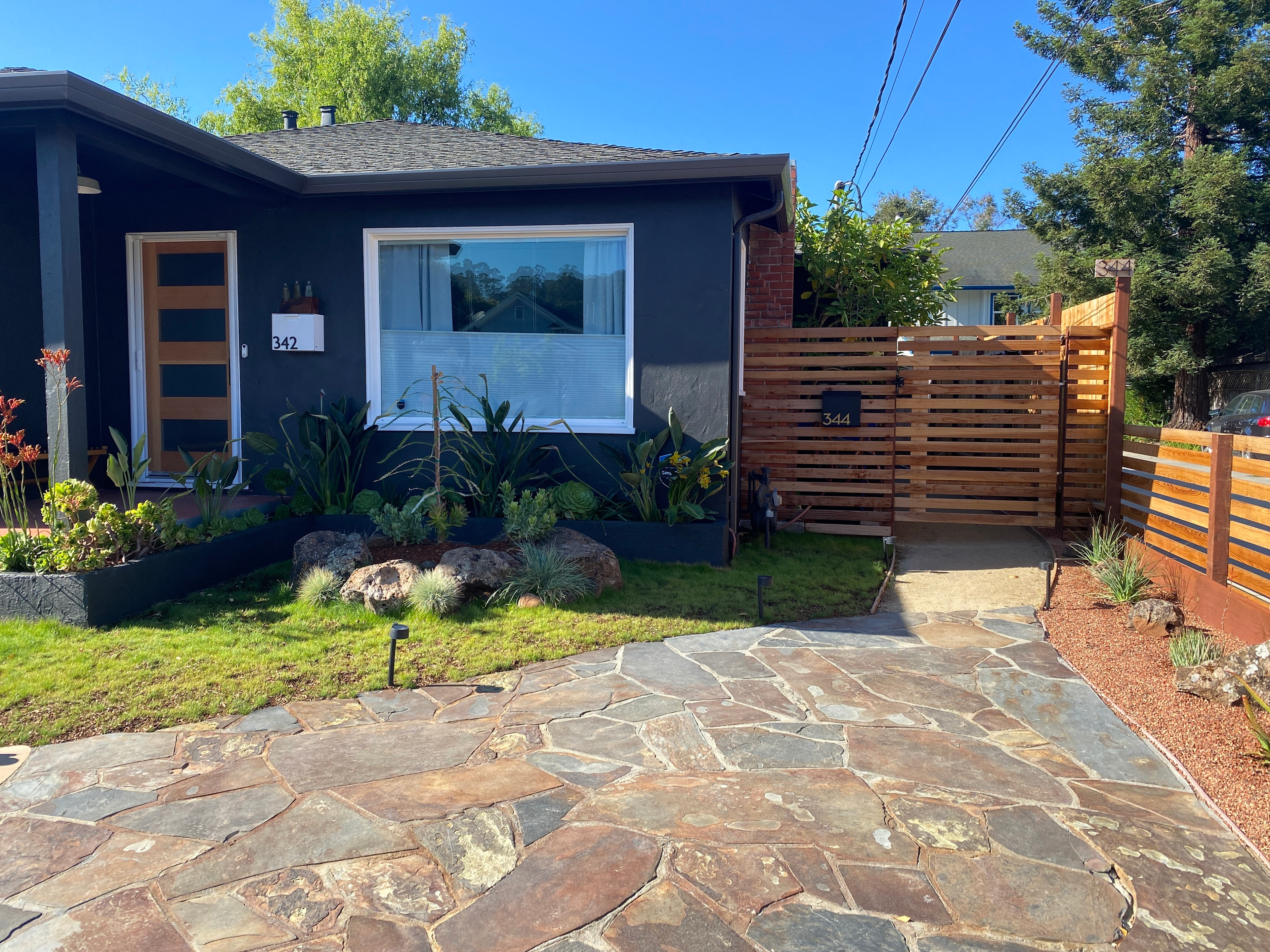 Entrance to backyard and Airstream