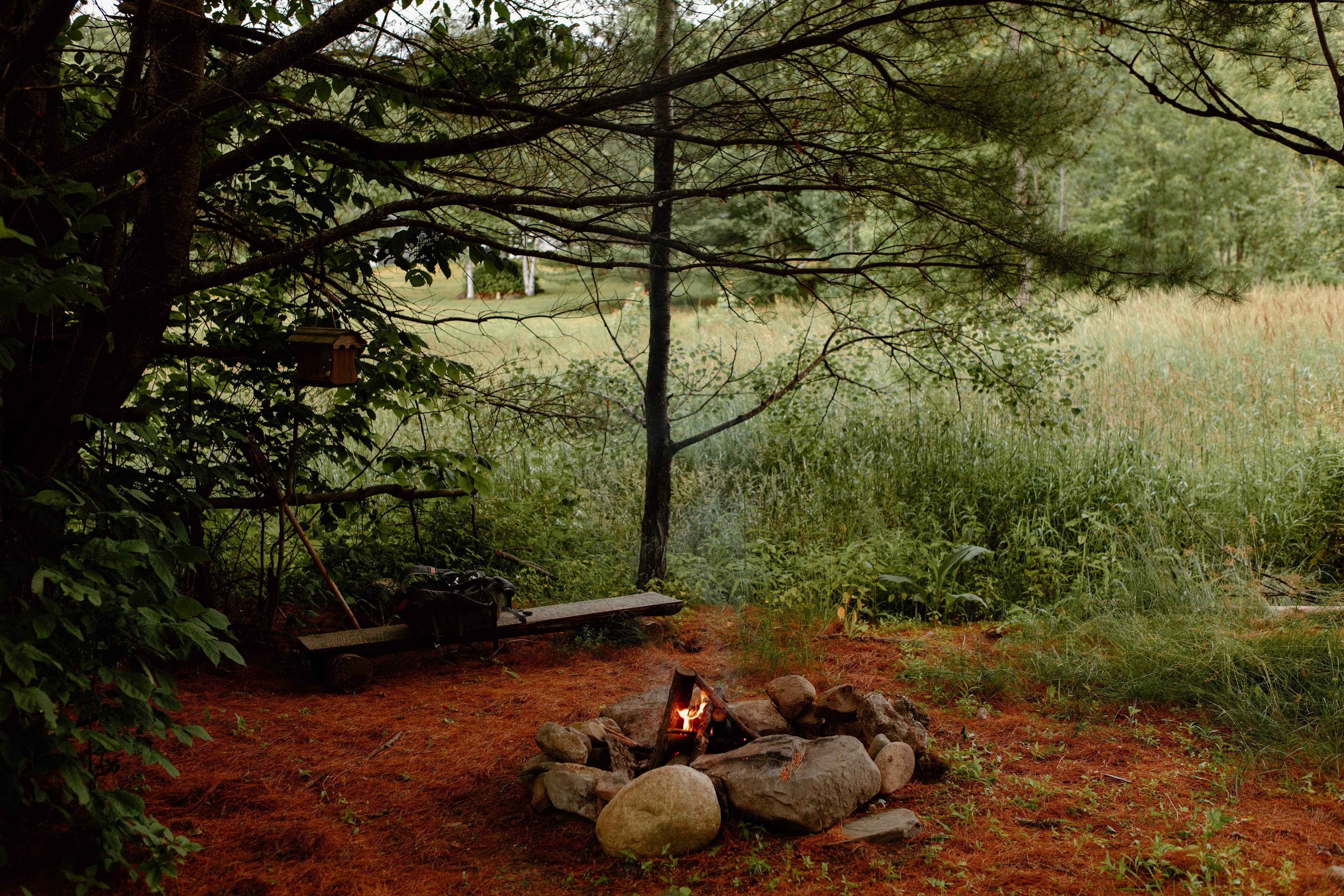 camp next to a small field 