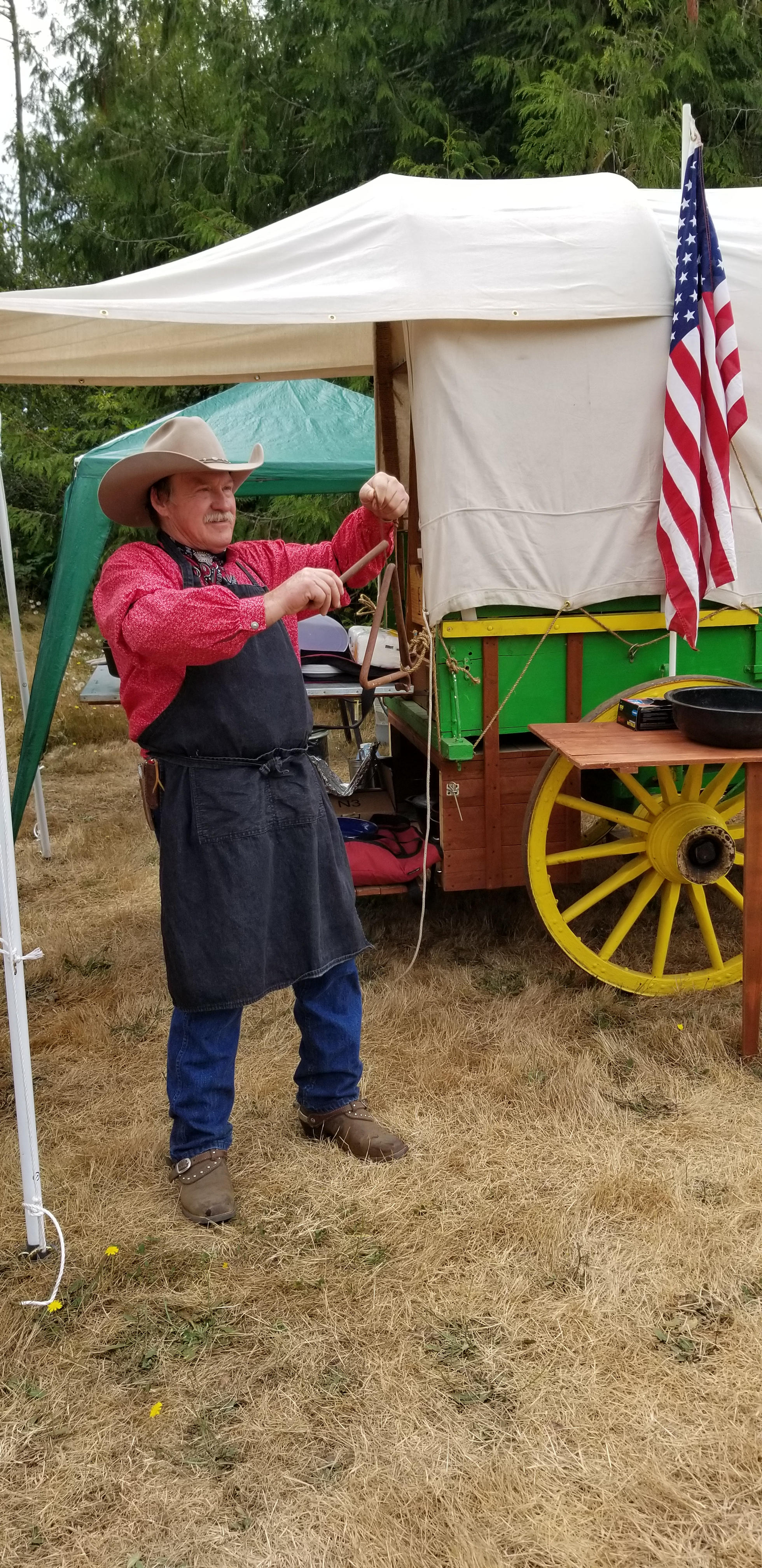 Ringing the dinner bell for Chuckwagon dinner :
"Chucks On ! Y'all come and get it !"