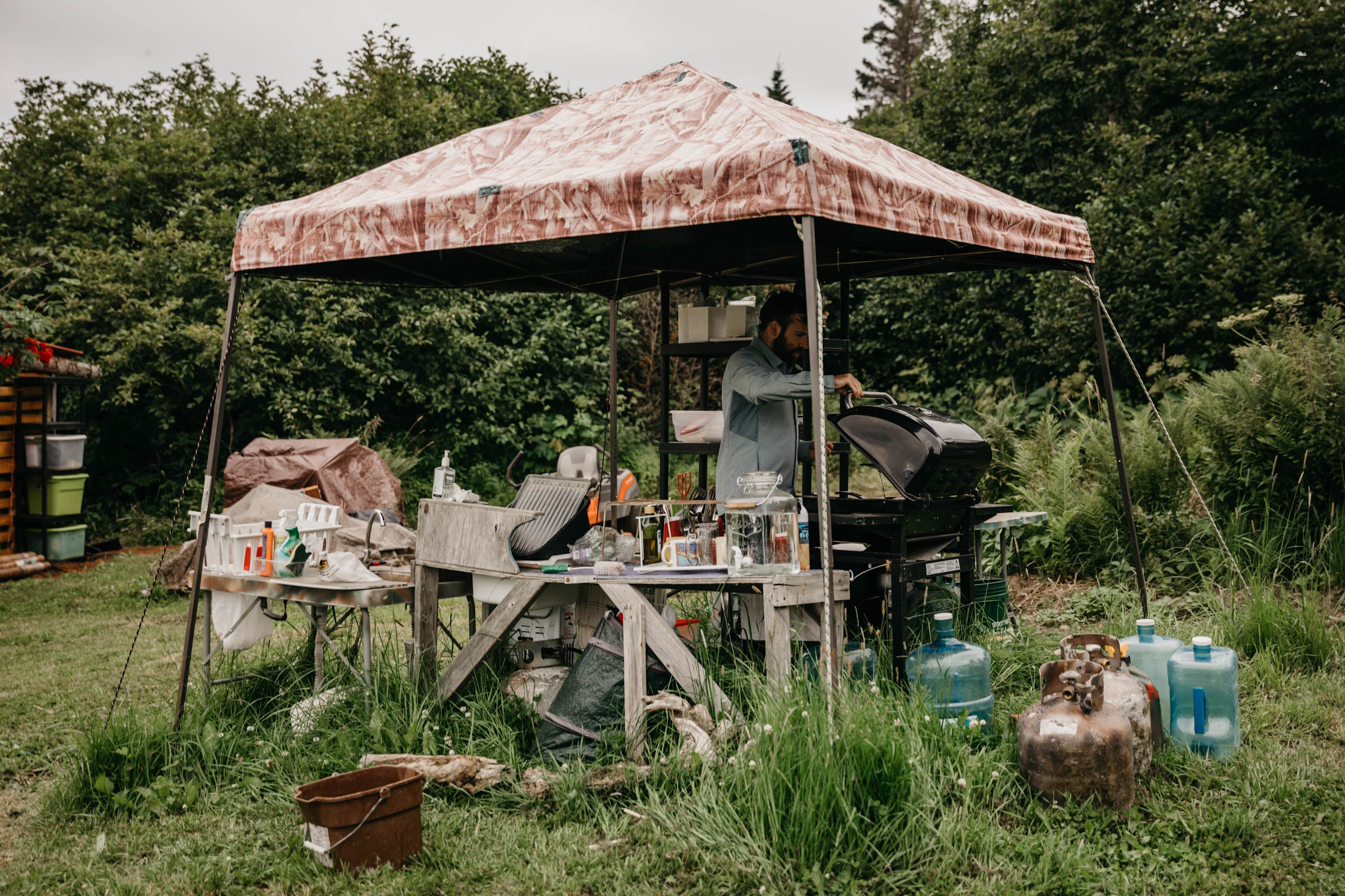 the cooking tent has everything you need! water, cutlery, bbq, fuel, a cover incase of rain, and space for a couple humans