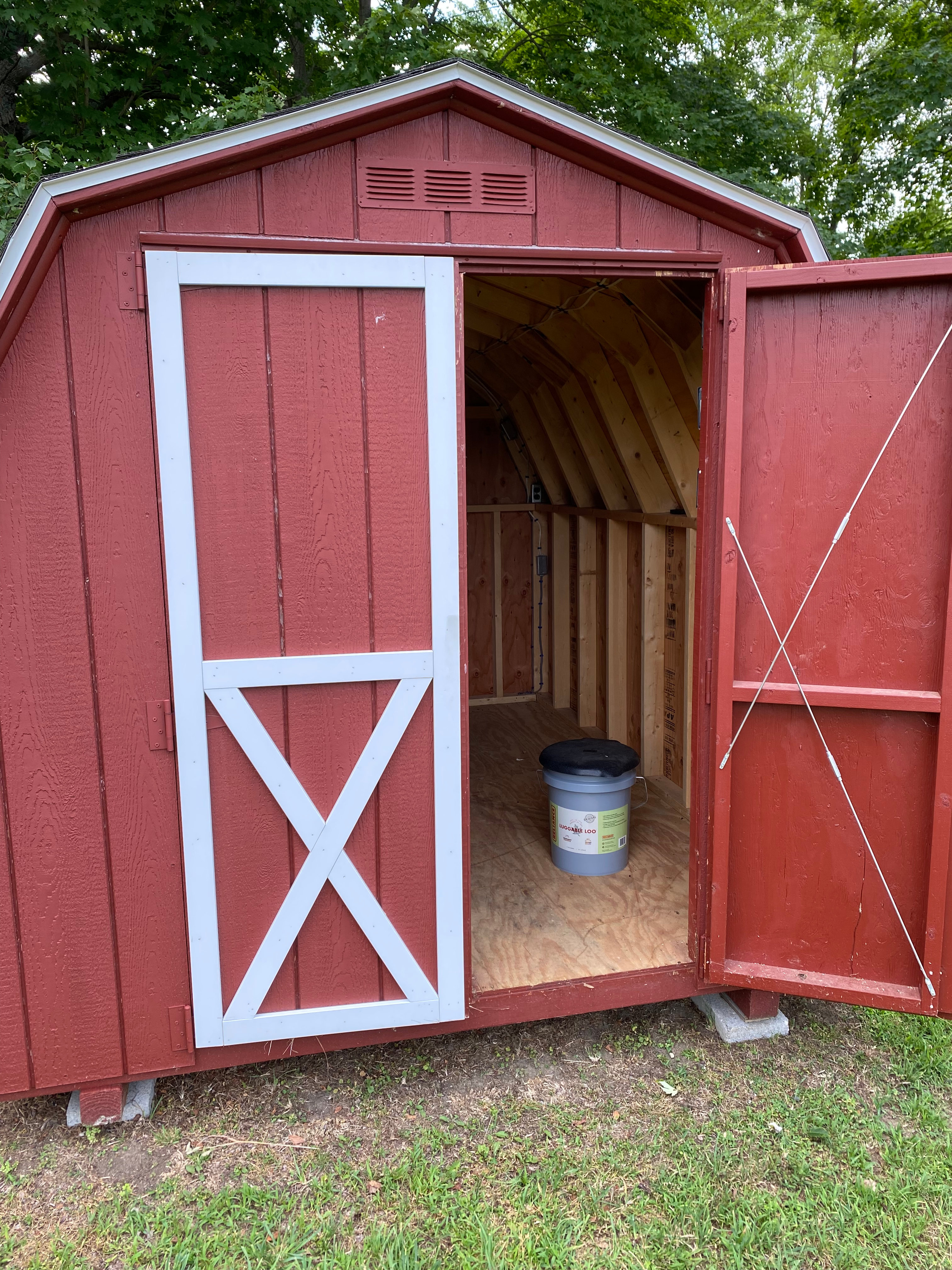 The luggable loo is located in our red shed, you must provide bags. There is electric in there, so you can switch the light on at night.