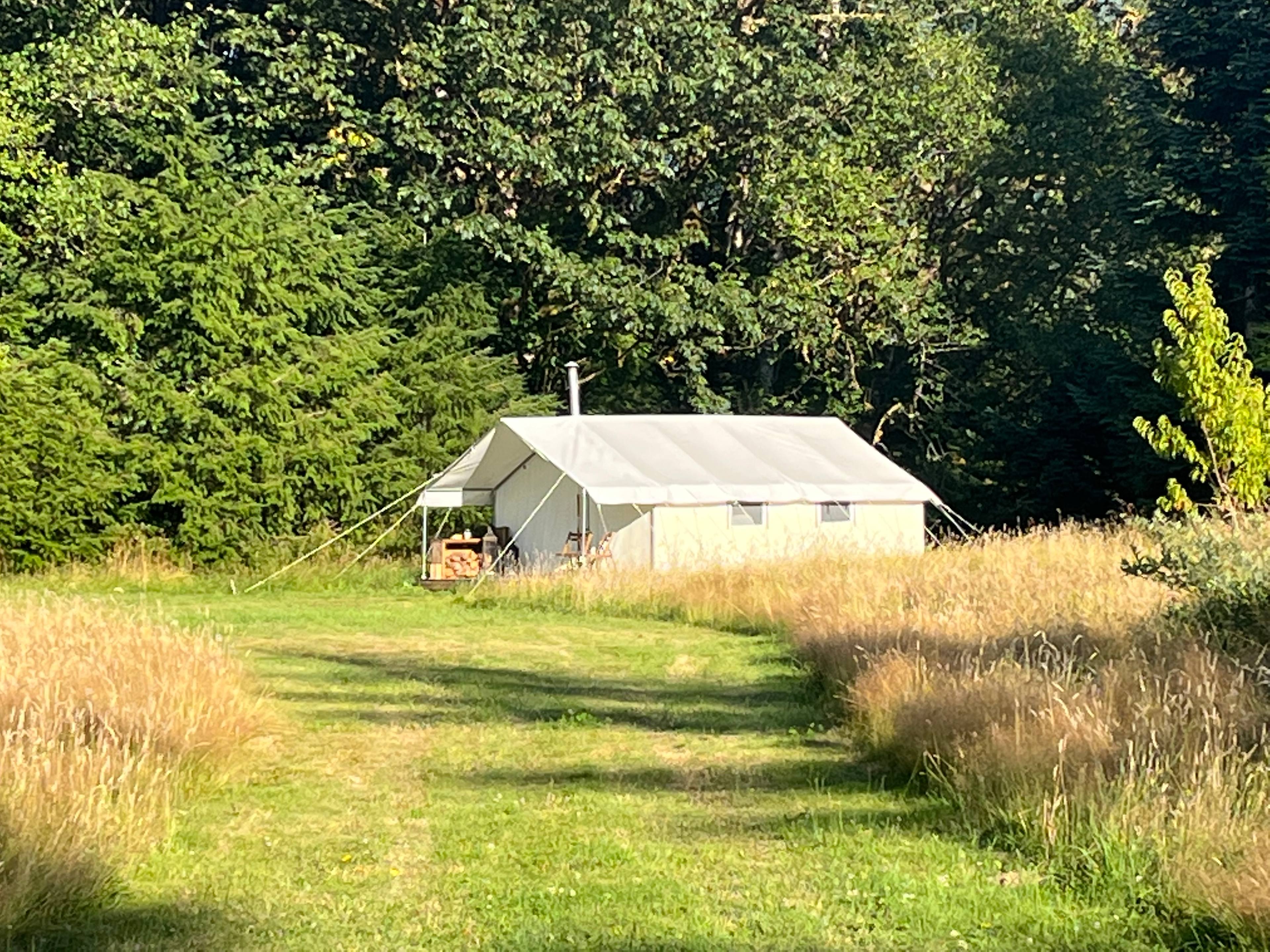 The Black Walnut Tent.  Park in front of tent on left of photo up against trees.