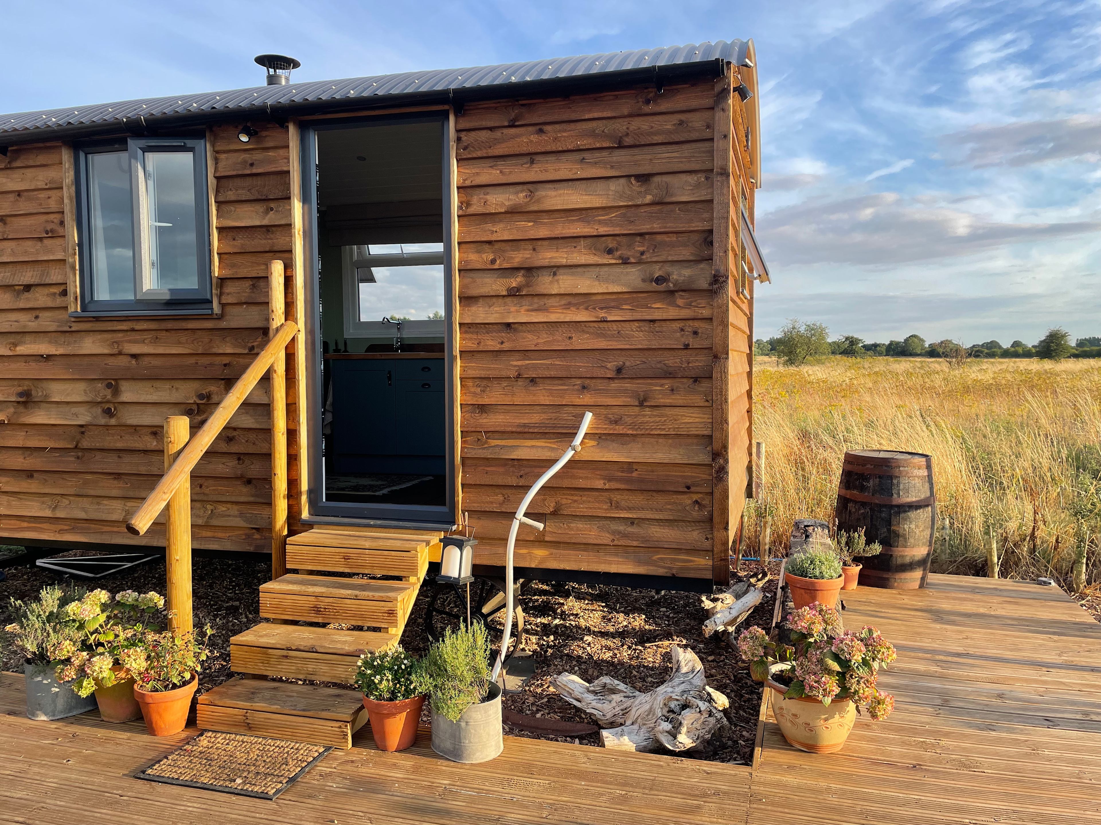 Wrap around deck and countryside surroundings