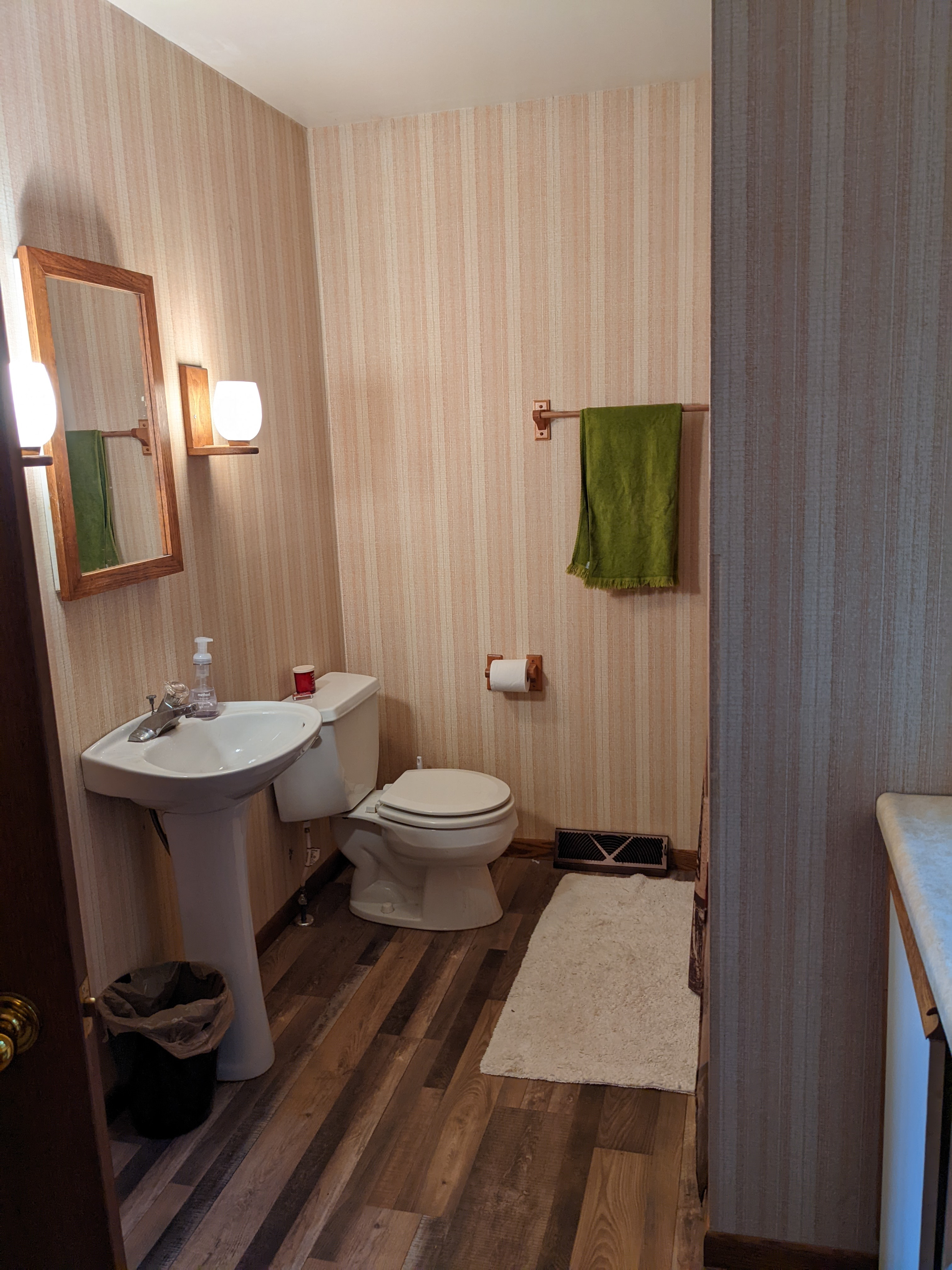 Main floor “Jack and Jill” full bathroom connected to the master bedroom