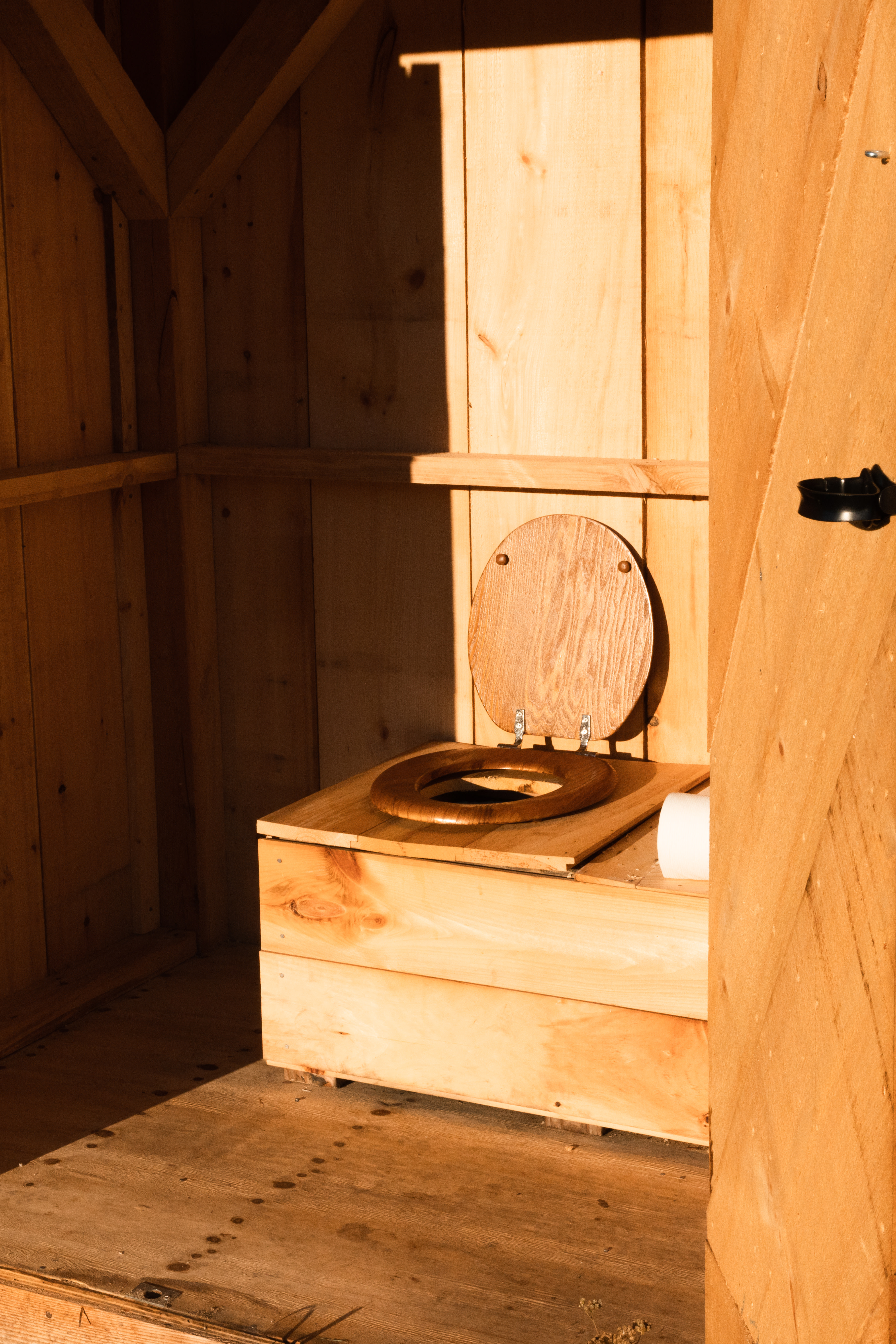 The on-site toilet is in a centrally located hut.