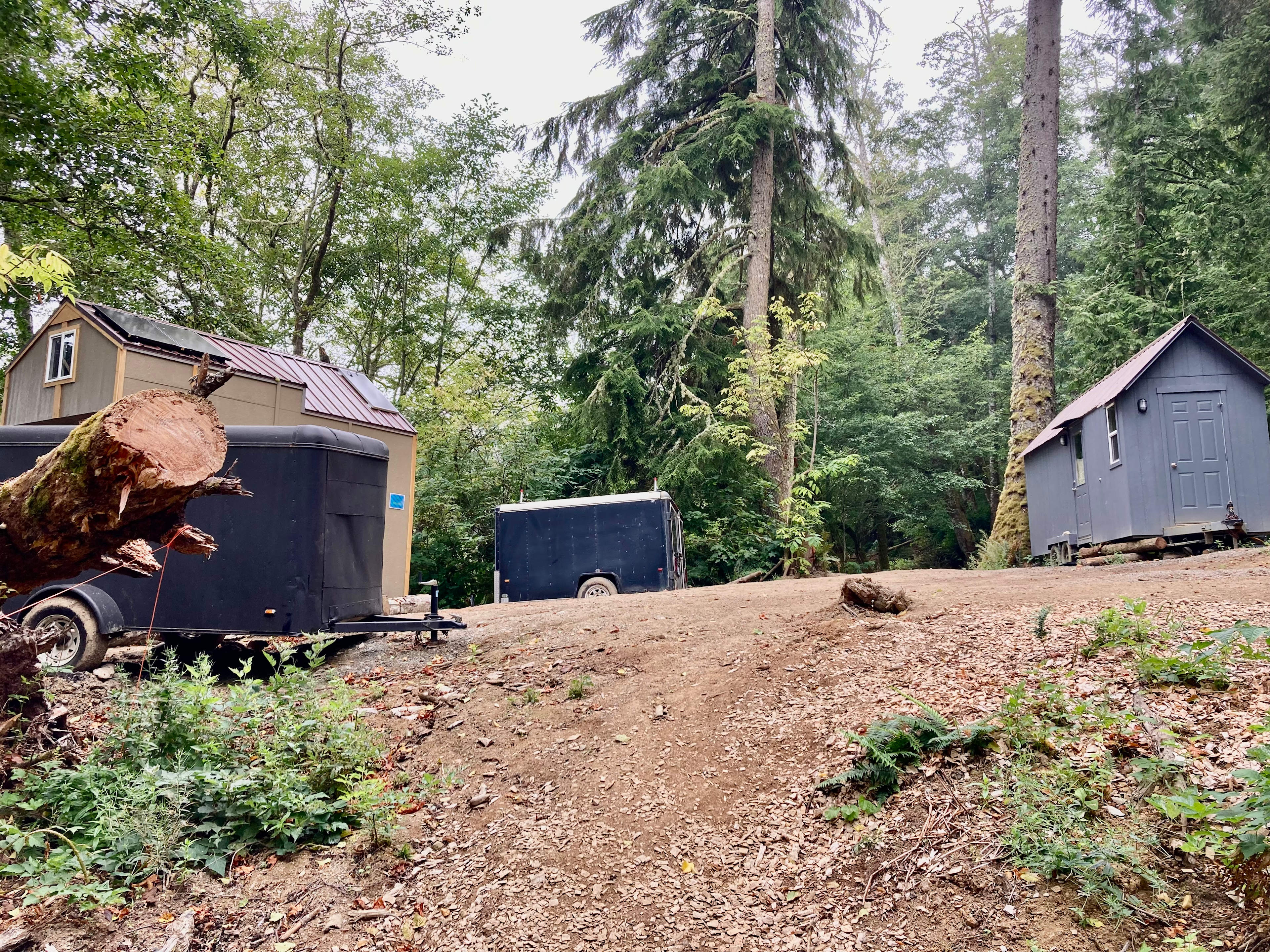 Buildings and trailers around End Of The World parking spot