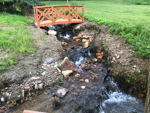 One creek next to large patio