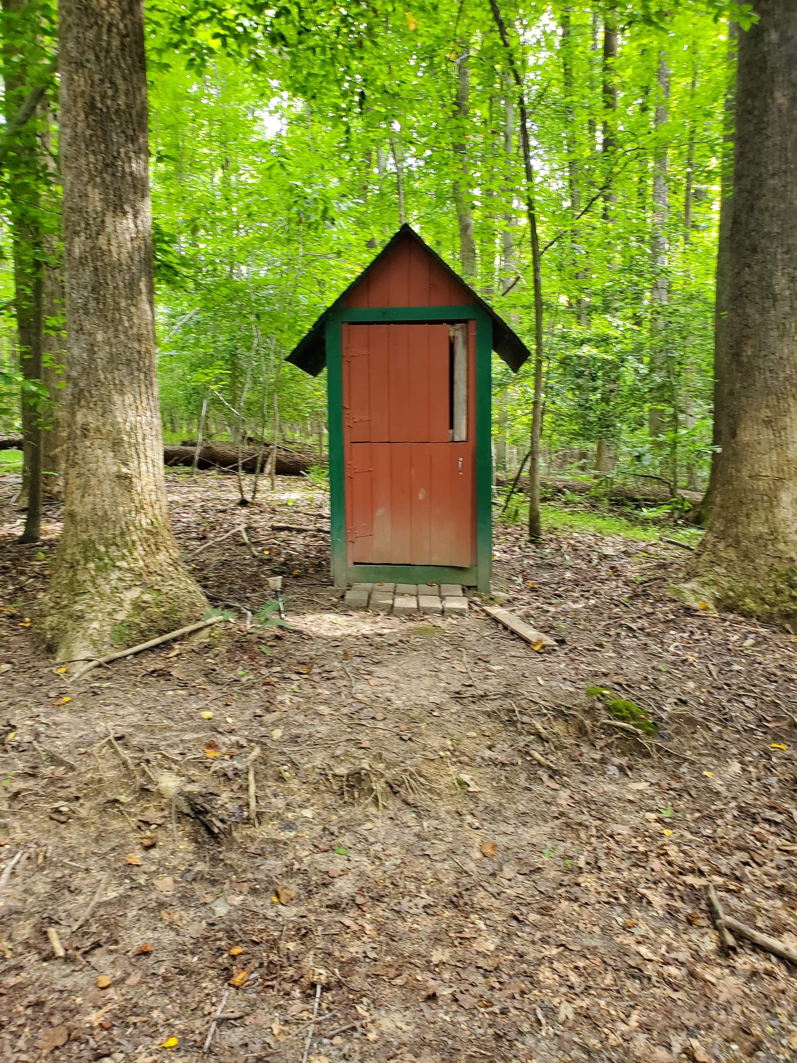 The outhouse! Equipped with toiletries & hand sanitizer!