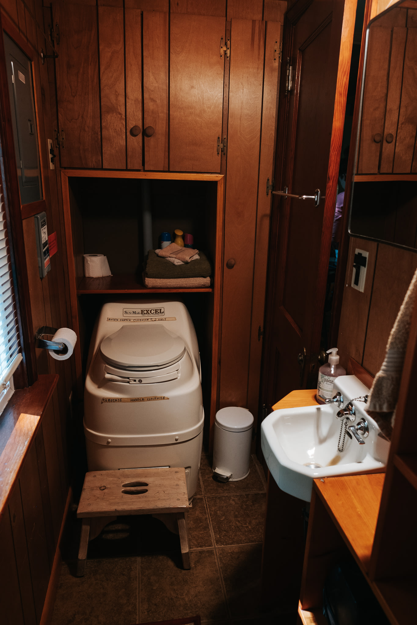 A bathroom complete with a compost toilet, sink, shower and anything you could need!
