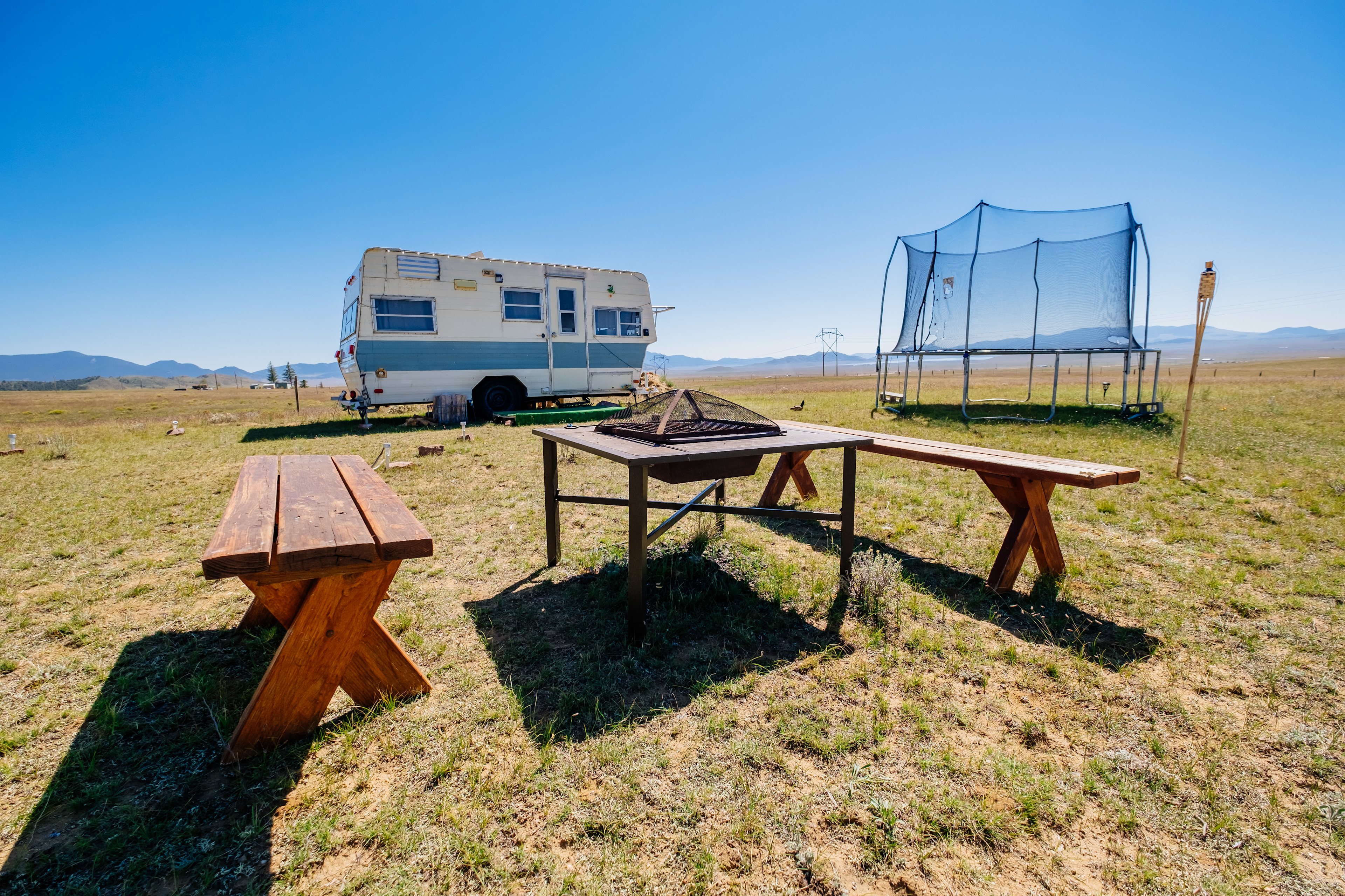 Firepit, trampoline and camper