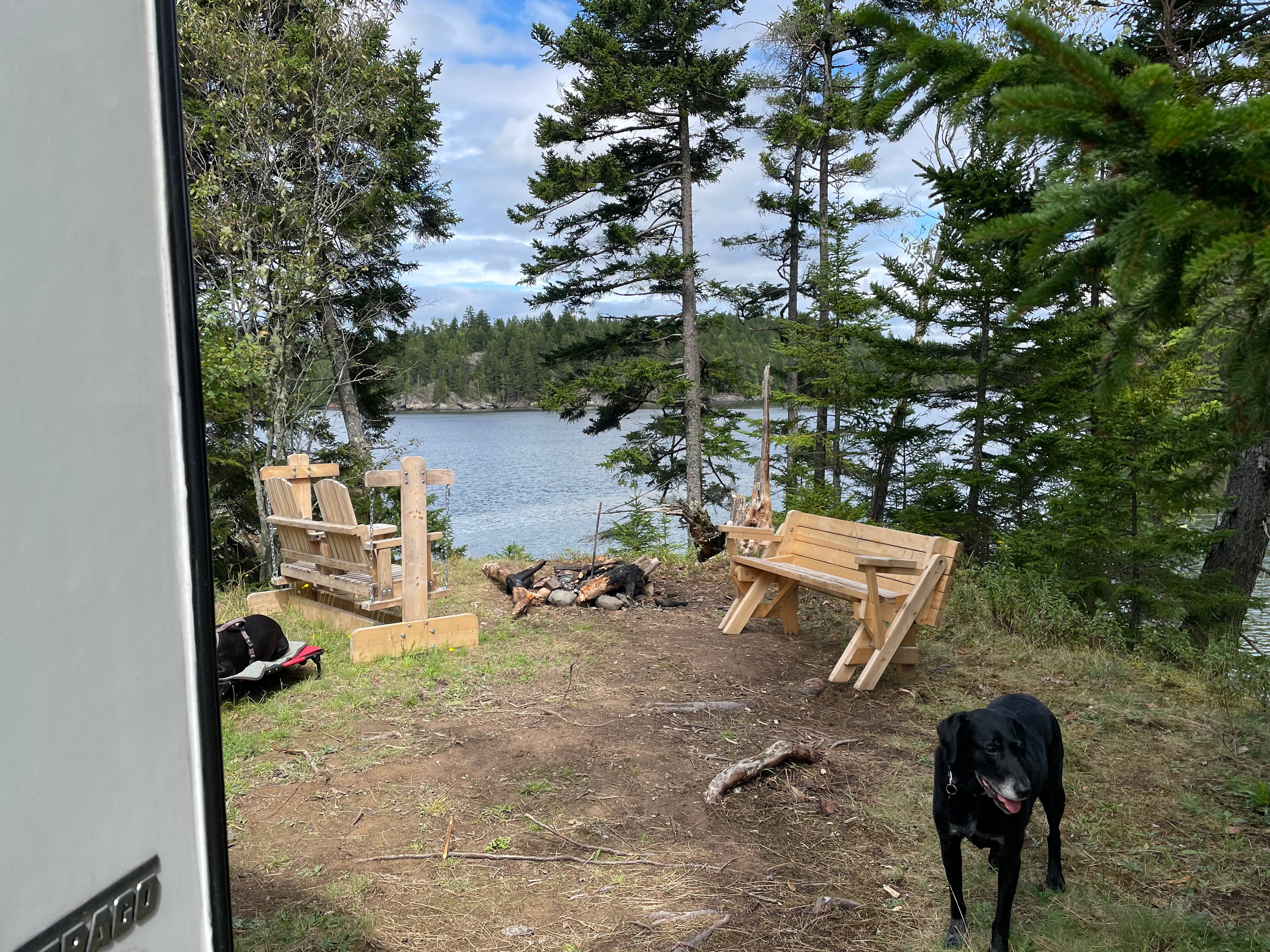 Swinging bench and picnic table with a view!