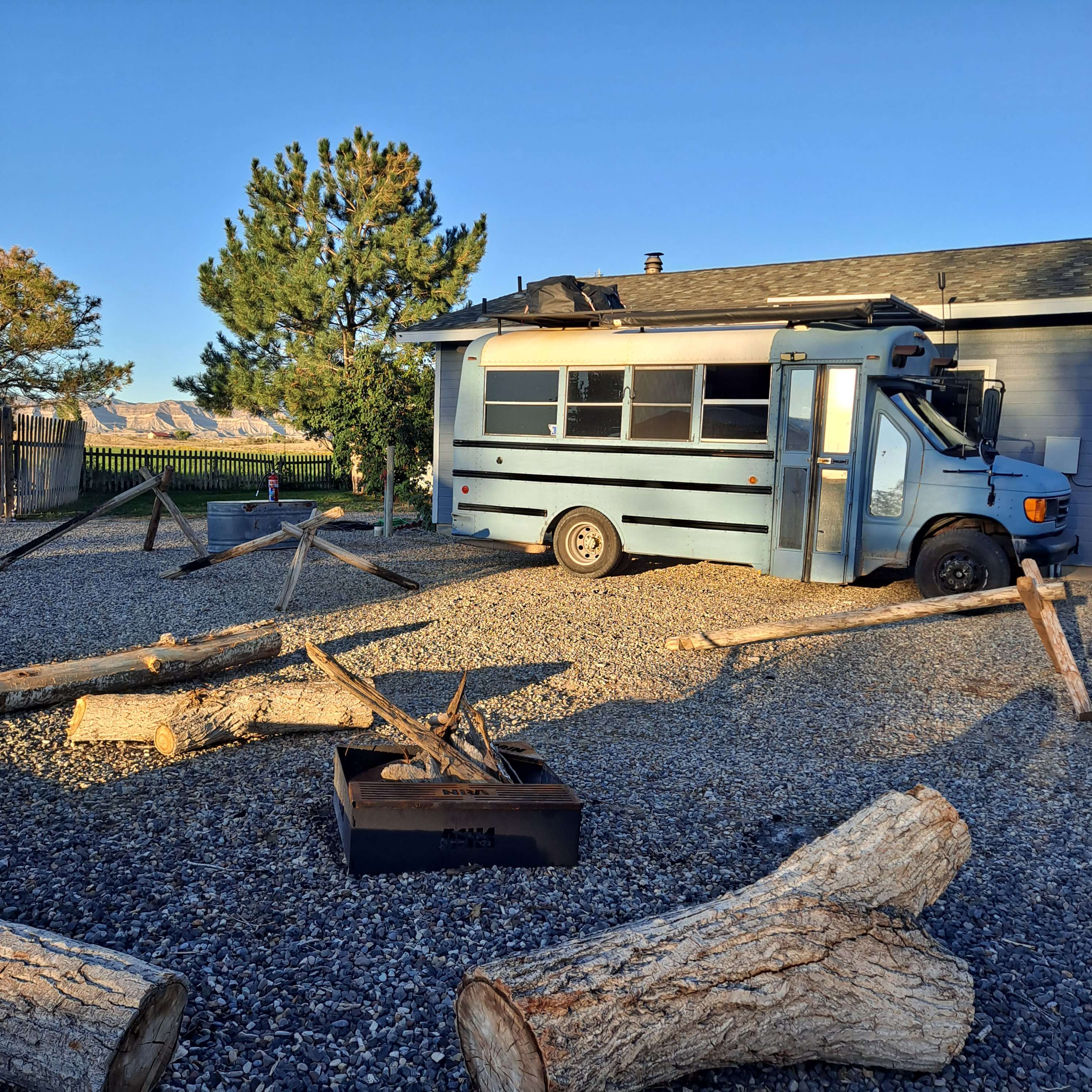 The campsite with firepit, hammock on the right out of view